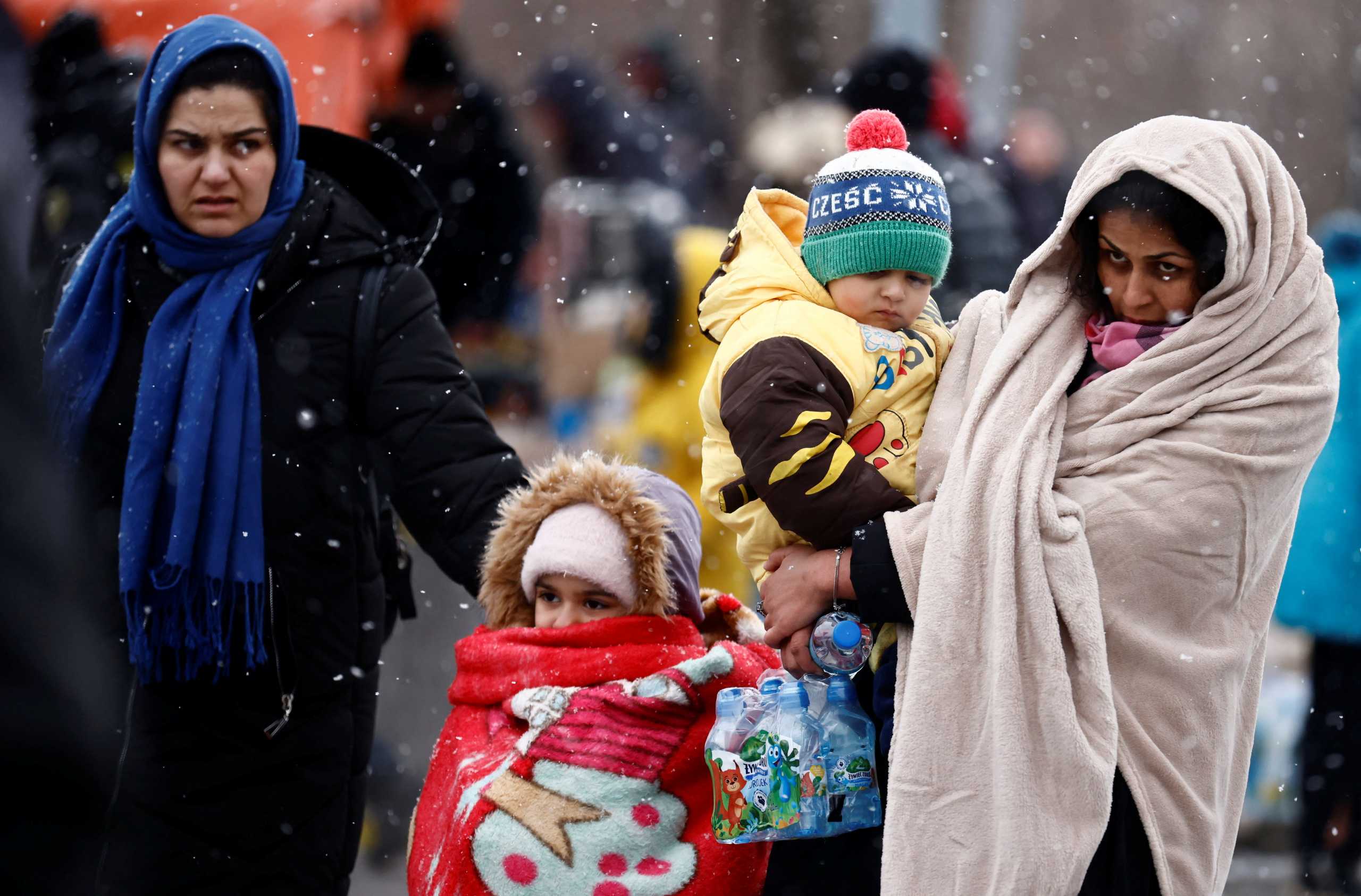 People fleeing Russian invasion of Ukraine arrive at a temporary camp in Przemysl, Poland, February 28, 2022. REUTERS