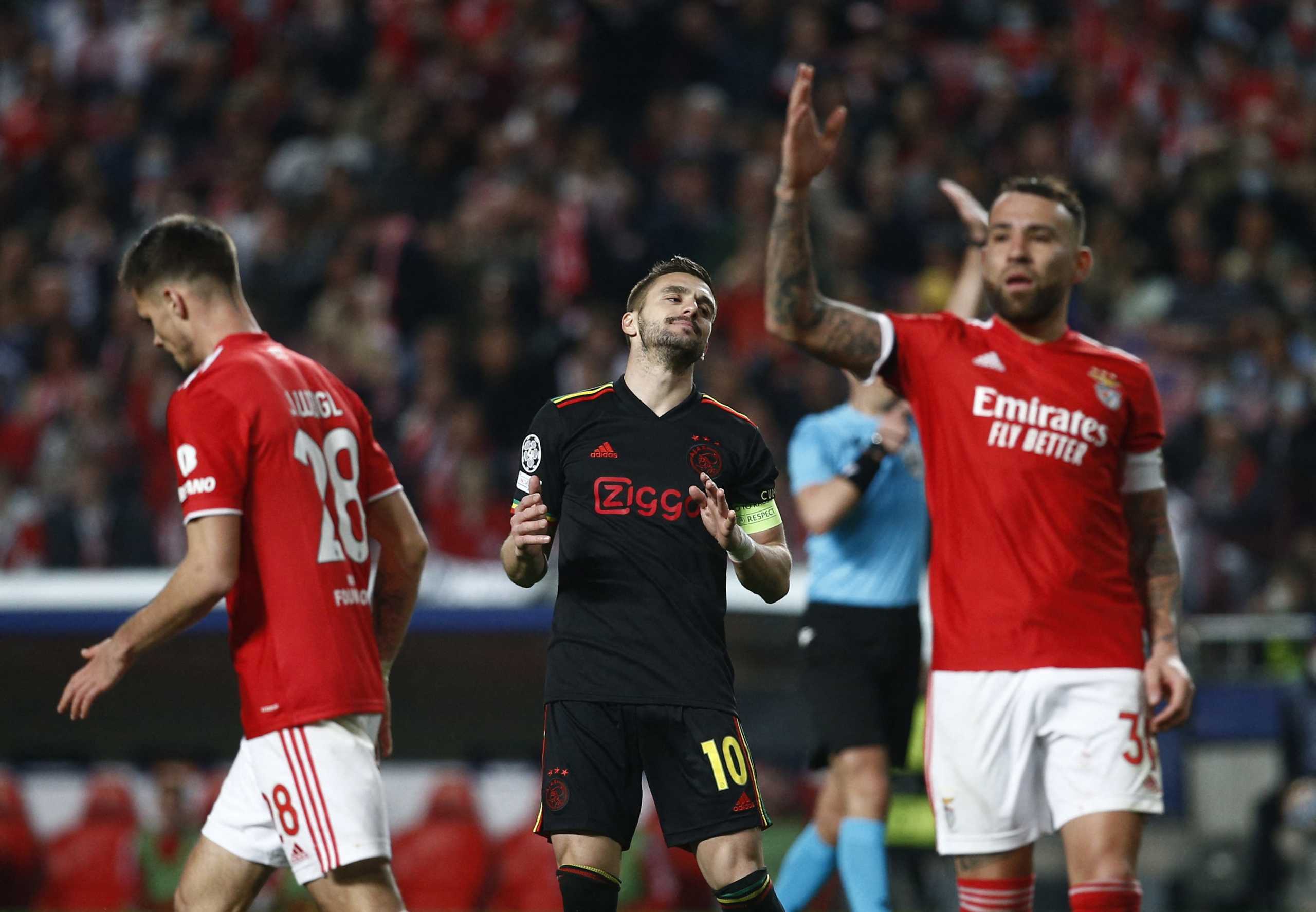 Soccer Football - Champions League - Round of 16 First Leg - Benfica v Ajax Amsterdam - Estadio da Luz, Lisbon, Portugal - February 23, 2022  Ajax Amsterdam's Dusan Tadic reacts after missing a chance to score REUTERS