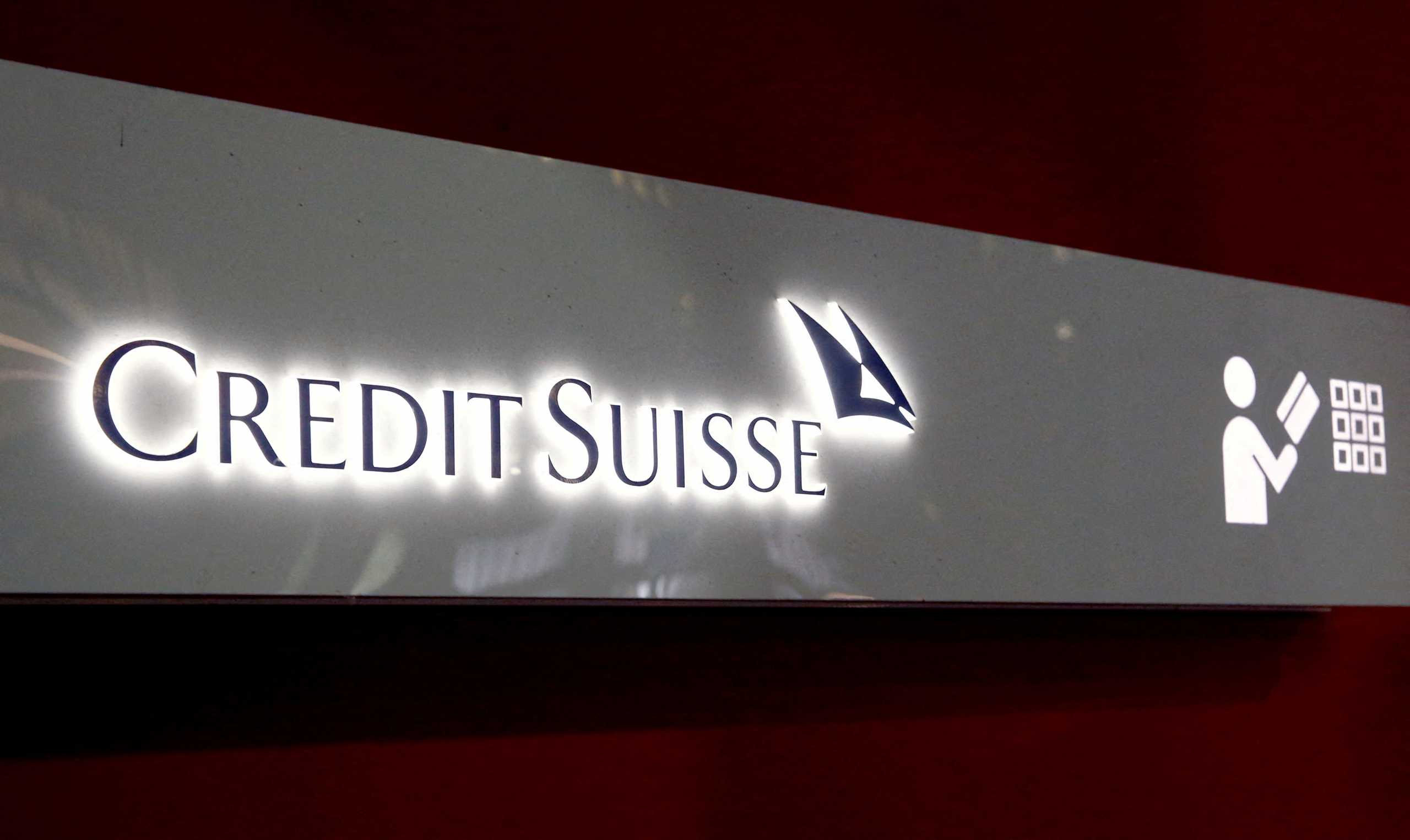 FILE PHOTO: The logo of Swiss bank Credit Suisse is seen at a branch office in Zurich, Switzerland, November 3, 2021. REUTERS