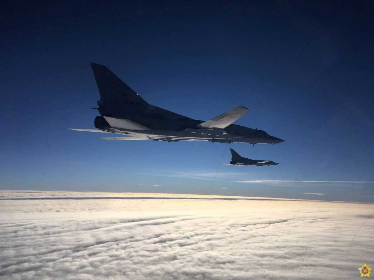 A view shows two Russian long-range strategic bombers Tu-22M3 during joint military exercises with Belarusian Air Forces in Belarusian air space, in this handout photo released February 5, 2022. Belarusian Defence Ministry