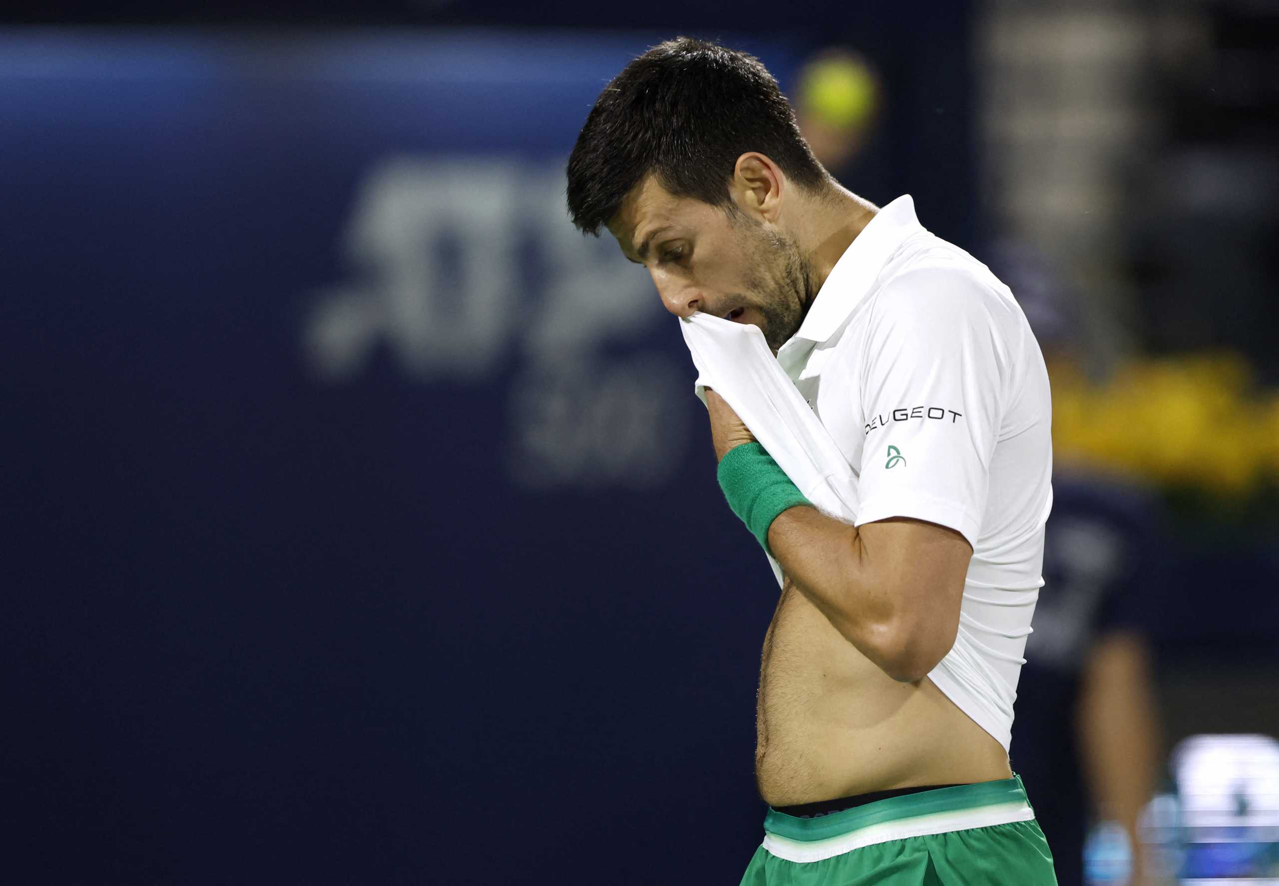 Tennis - ATP 500 - Dubai Tennis Championships - The Dubai Duty Free Tennis Centre, Dubai, United Arab Emirates - February 24, 2022 Serbia's Novak Djokovic wipes his face during his quarter final match against Czech Republic's Jiri Vesely REUTERS