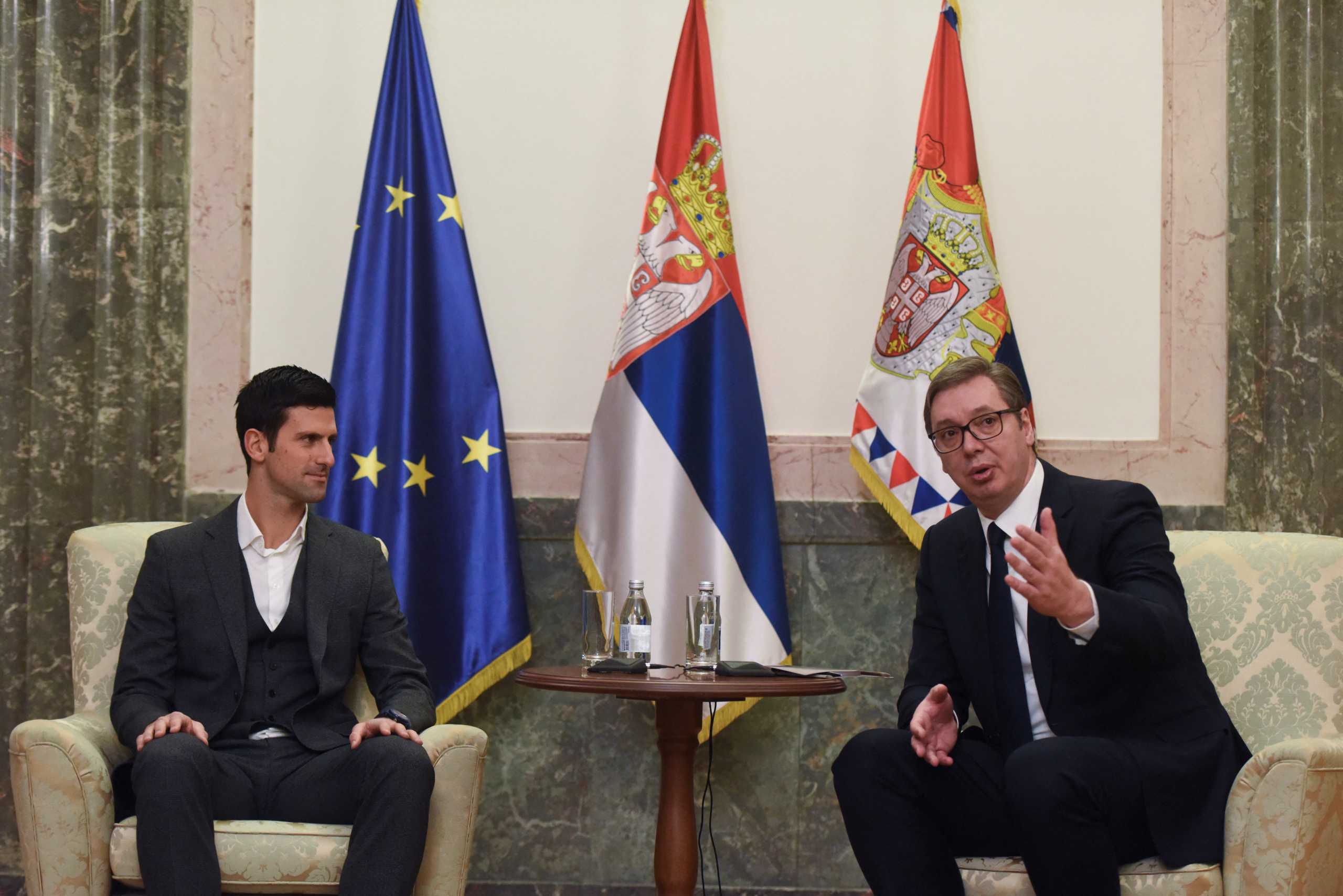 Serbian tennis player Novak Djokovic speaks with Serbia's President Aleksandar Vucic in Belgrade, Serbia, February 3, 2022. REUTERS