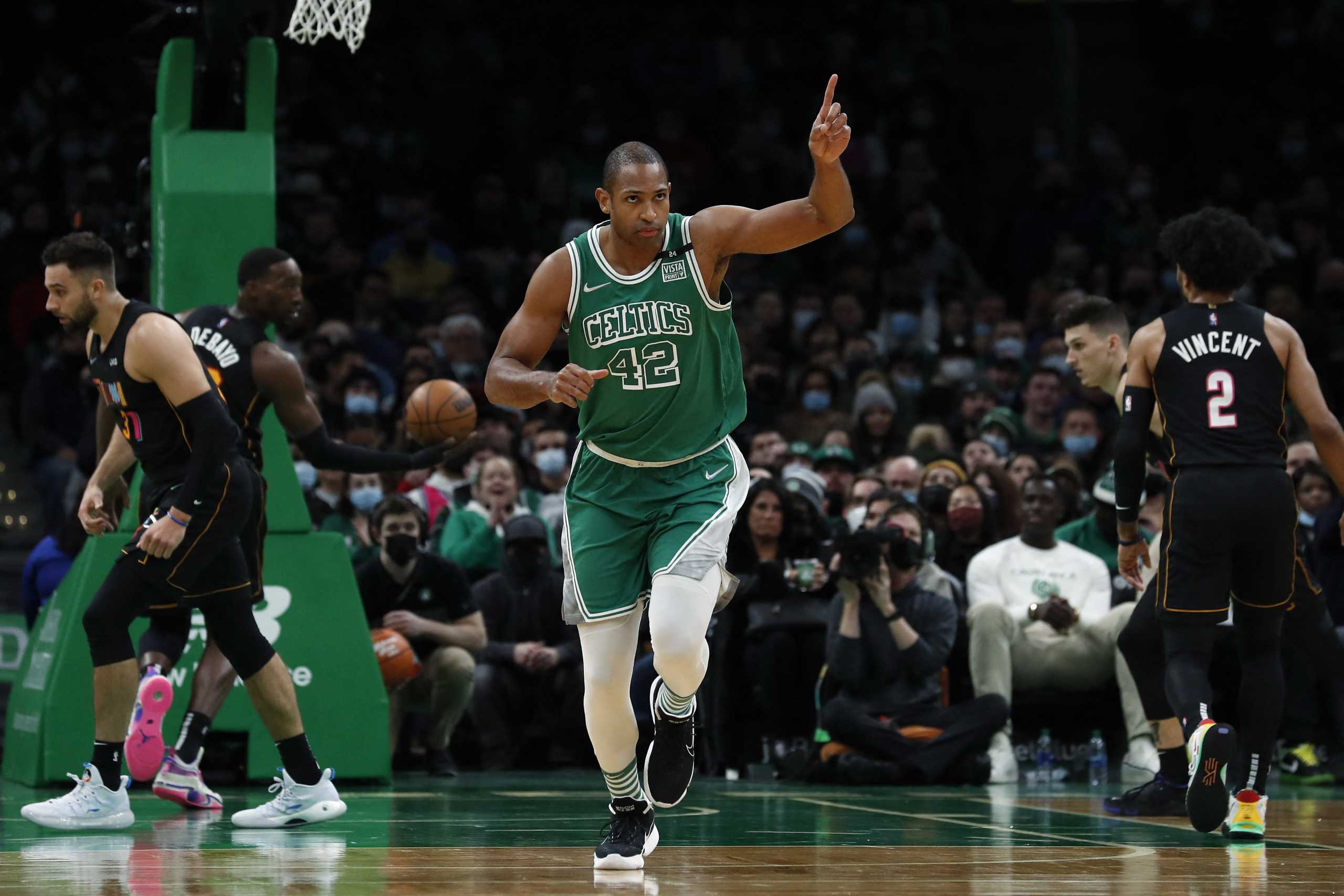 Jan 31, 2022; Boston, Massachusetts, USA; Boston Celtics center Al Horford (42) points to a teammate after a basket against the Miami Heat during the first quarter at TD Garden. Mandatory Credit: Winslow Townson-USA TODAY Sports