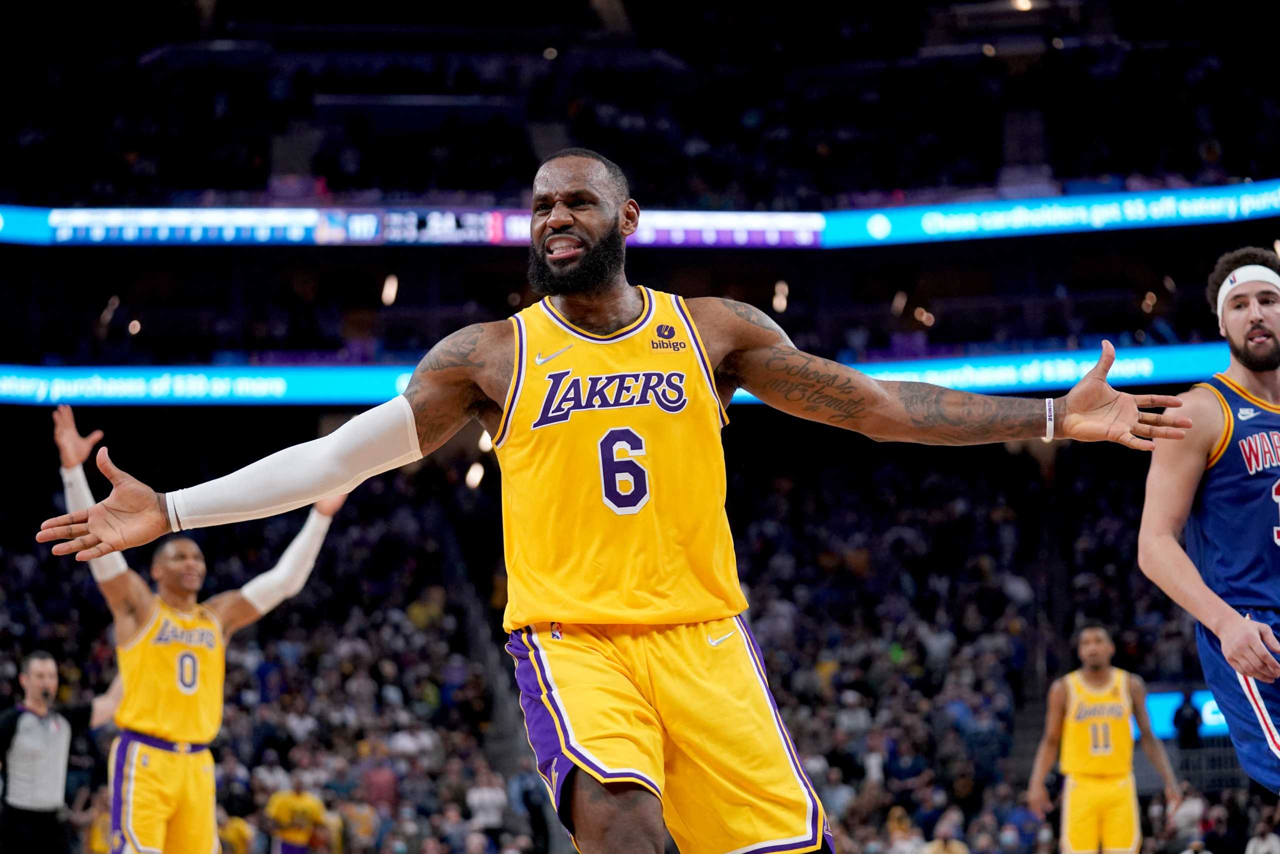 Feb 12, 2022; San Francisco, California, USA; Los Angeles Lakers forward LeBron James (6) reacts after being fouled while shooting a three point shot against the Golden State Warriors in the fourth quarter at the Chase Center. Mandatory Credit: Cary Edmondson-USA TODAY Sports