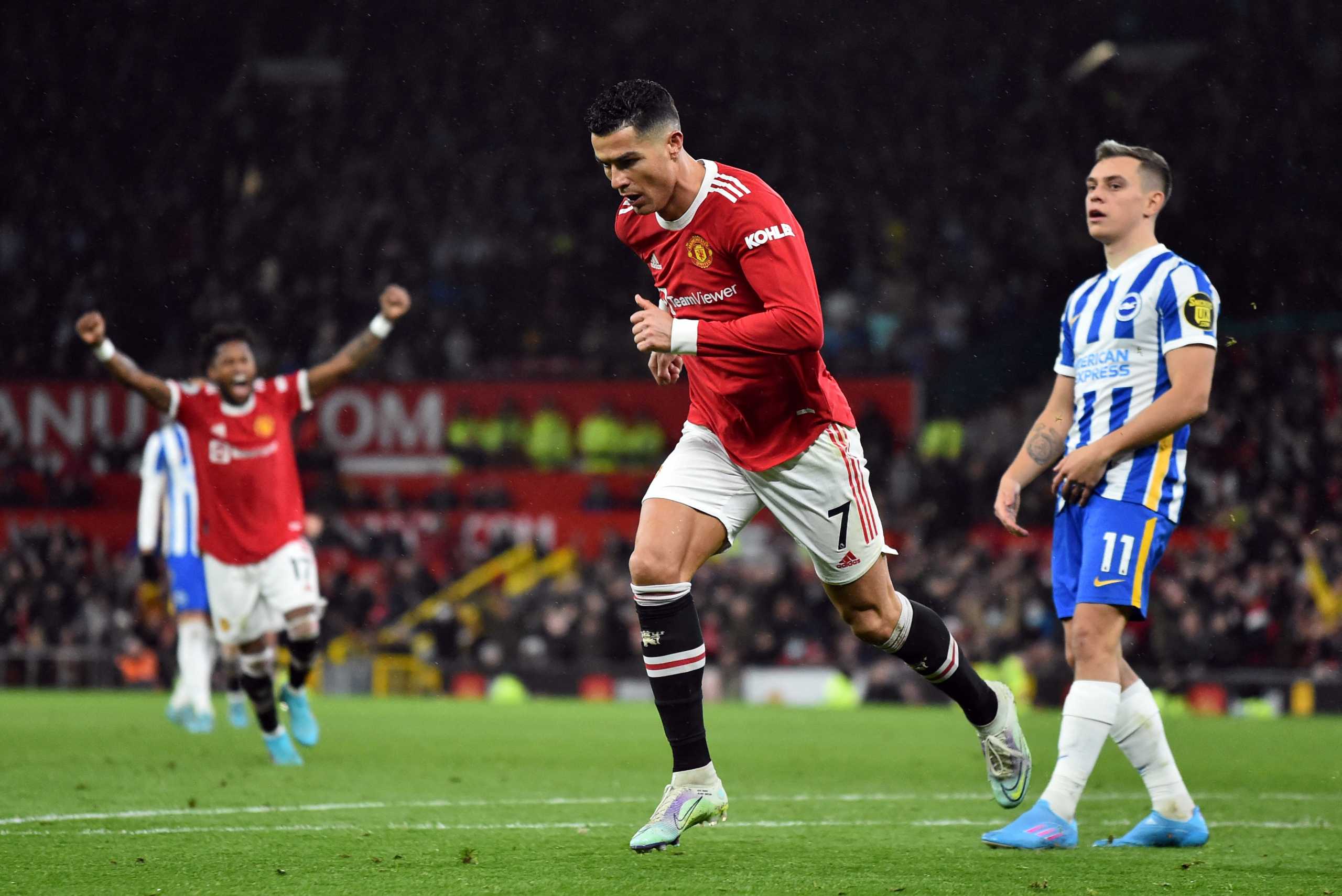 Soccer Football - Premier League - Manchester United v Brighton & Hove Albion - Old Trafford, Manchester, Britain - February 15, 2022  Manchester United's Cristiano Ronaldo celebrates scoring their first goal REUTERS
