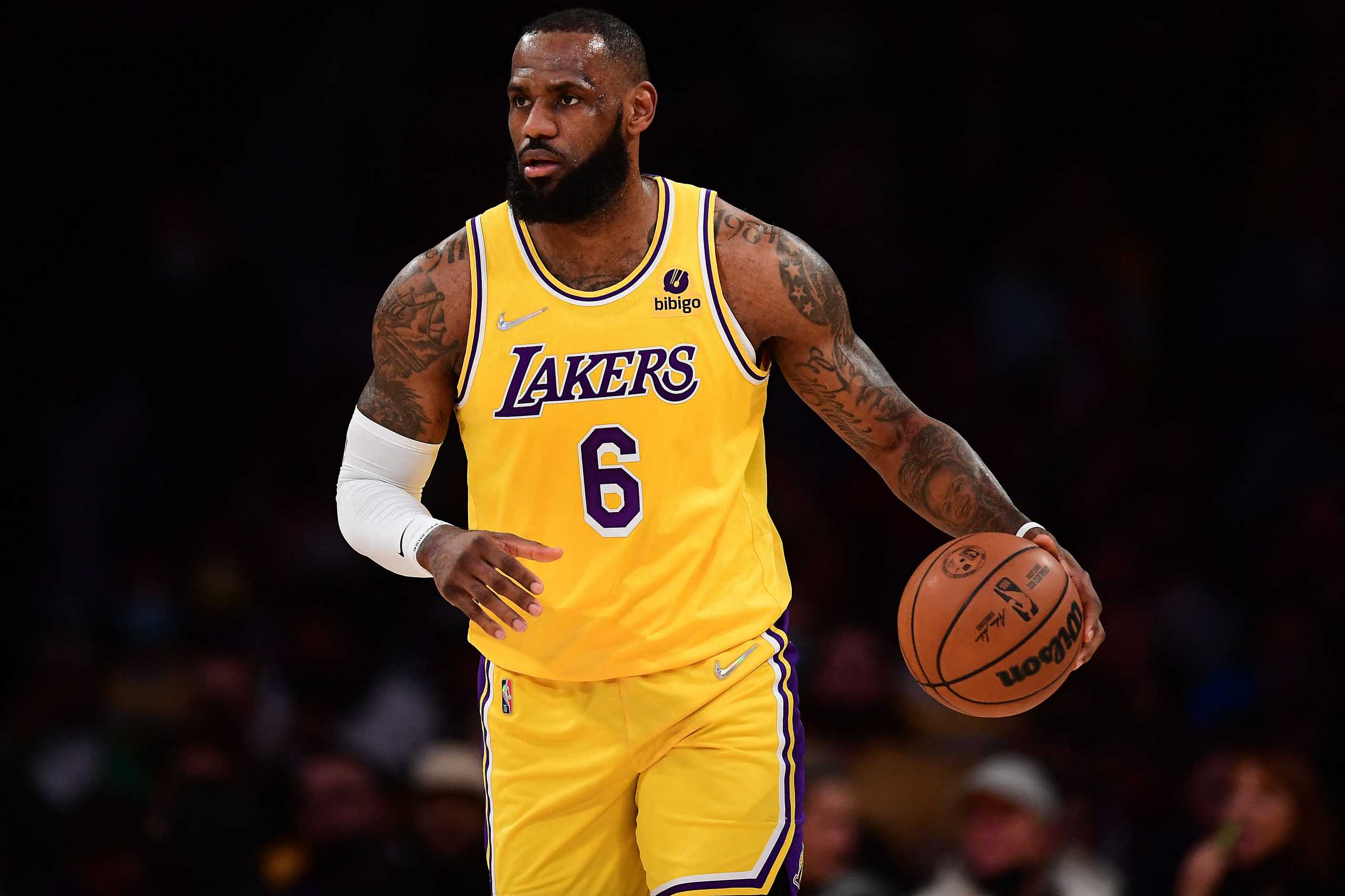 Feb 8, 2022; Los Angeles, California, USA; Los Angeles Lakers forward LeBron James (6) controls the ball against the Milwaukee Bucks during the first half at Crypto.com Arena. Mandatory Credit: Gary A. Vasquez-USA TODAY Sports