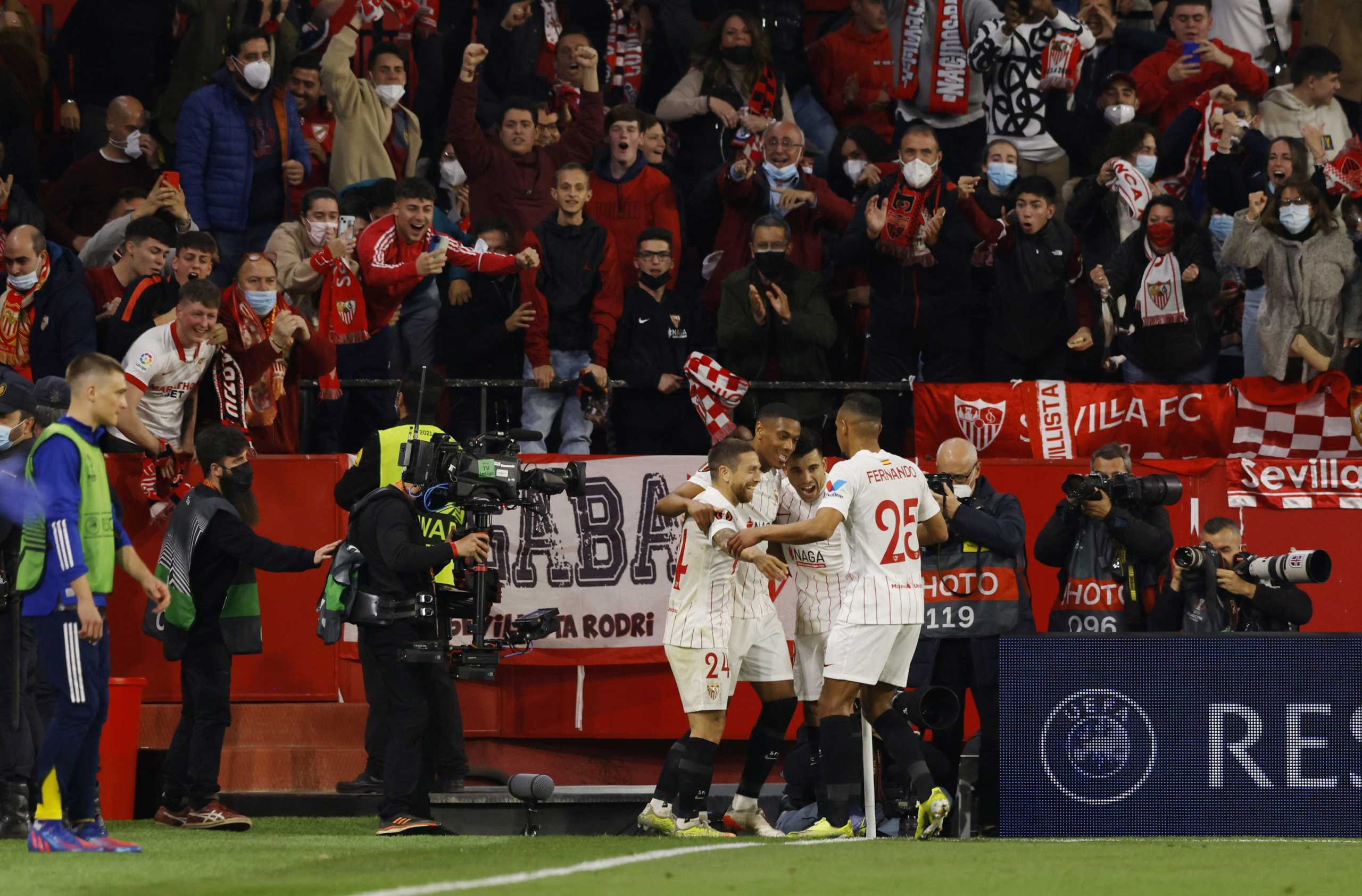 Soccer Football - Europa League - Play Off First Leg - Sevilla v Dinamo Zagreb - Ramon Sanchez Pizjuan, Seville, Spain - February 17, 2022  Sevilla's Anthony Martial celebrates scoring their third goal with teammates REUTERS