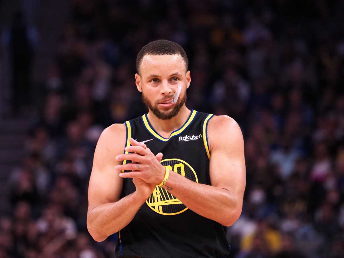 Feb 27, 2022; San Francisco, California, USA; Golden State Warriors guard Stephen Curry (30) claps between plays against the Dallas Mavericks during the fourth quarter at Chase Center. Mandatory Credit: Kelley L Cox-USA TODAY Sports