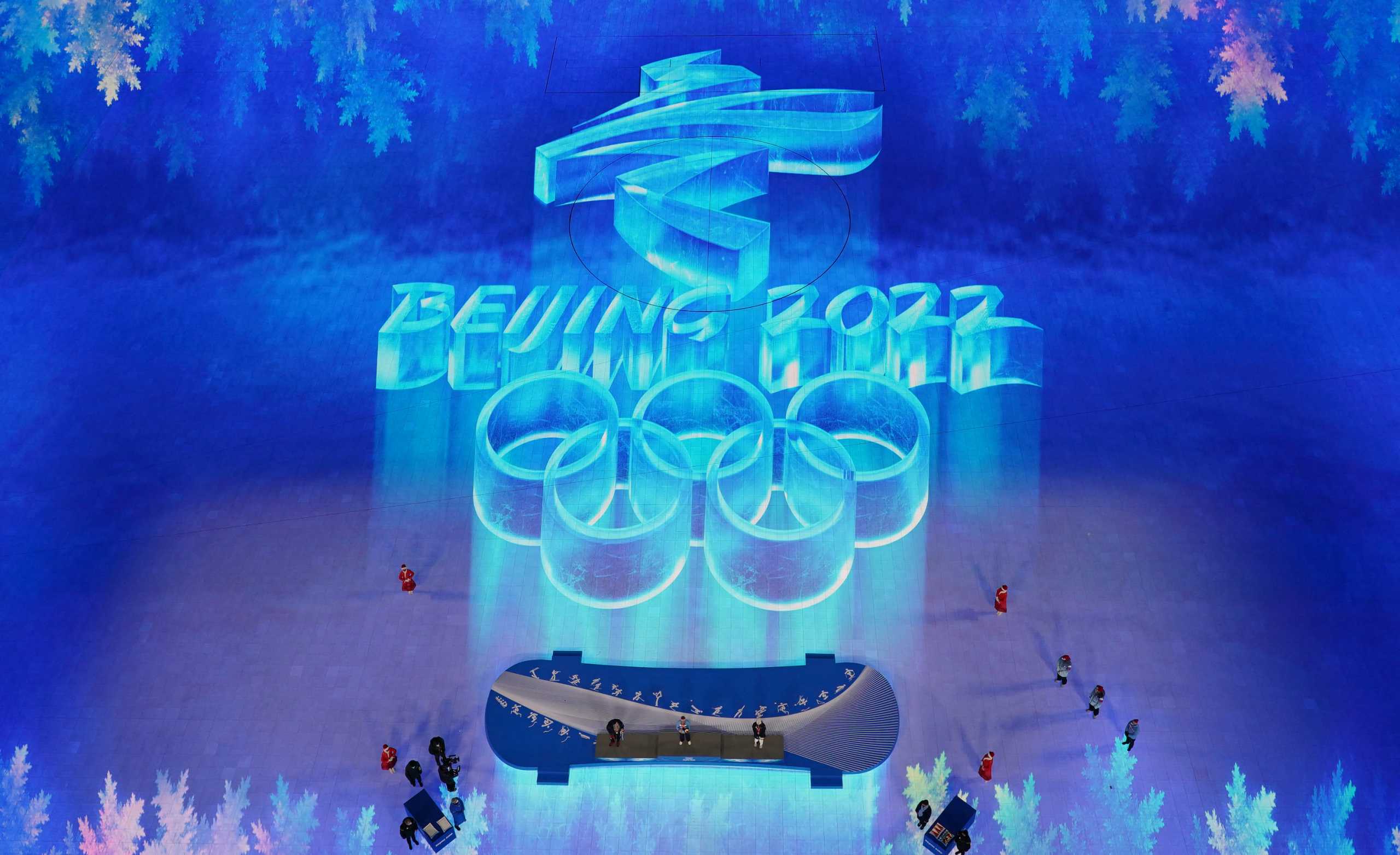 2022 Beijing Olympics - Victory Ceremony - Cross-Country Skiing - Women's 30km Mass Start Free - National Stadium, Beijing, China - February 20, 2022. General view of Gold medallist, Therese Johaug of Norway on the podium with silver medallist, Jessie Diggins of the United States and bronze medallist, Kerttu Niskanen of Finland. REUTERS