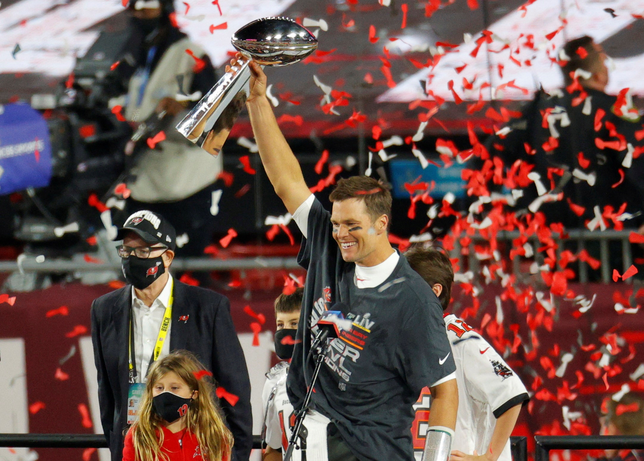 FILE PHOTO: NFL Football - Super Bowl LV - Tampa Bay Buccaneers v Kansas City Chiefs - Raymond James Stadium, Tampa, Florida, U.S. - February 7, 2021 Tampa Bay Buccaneers' Tom Brady celebrates with the Vince Lombardi trophy after winning the Super Bowl LV REUTERS