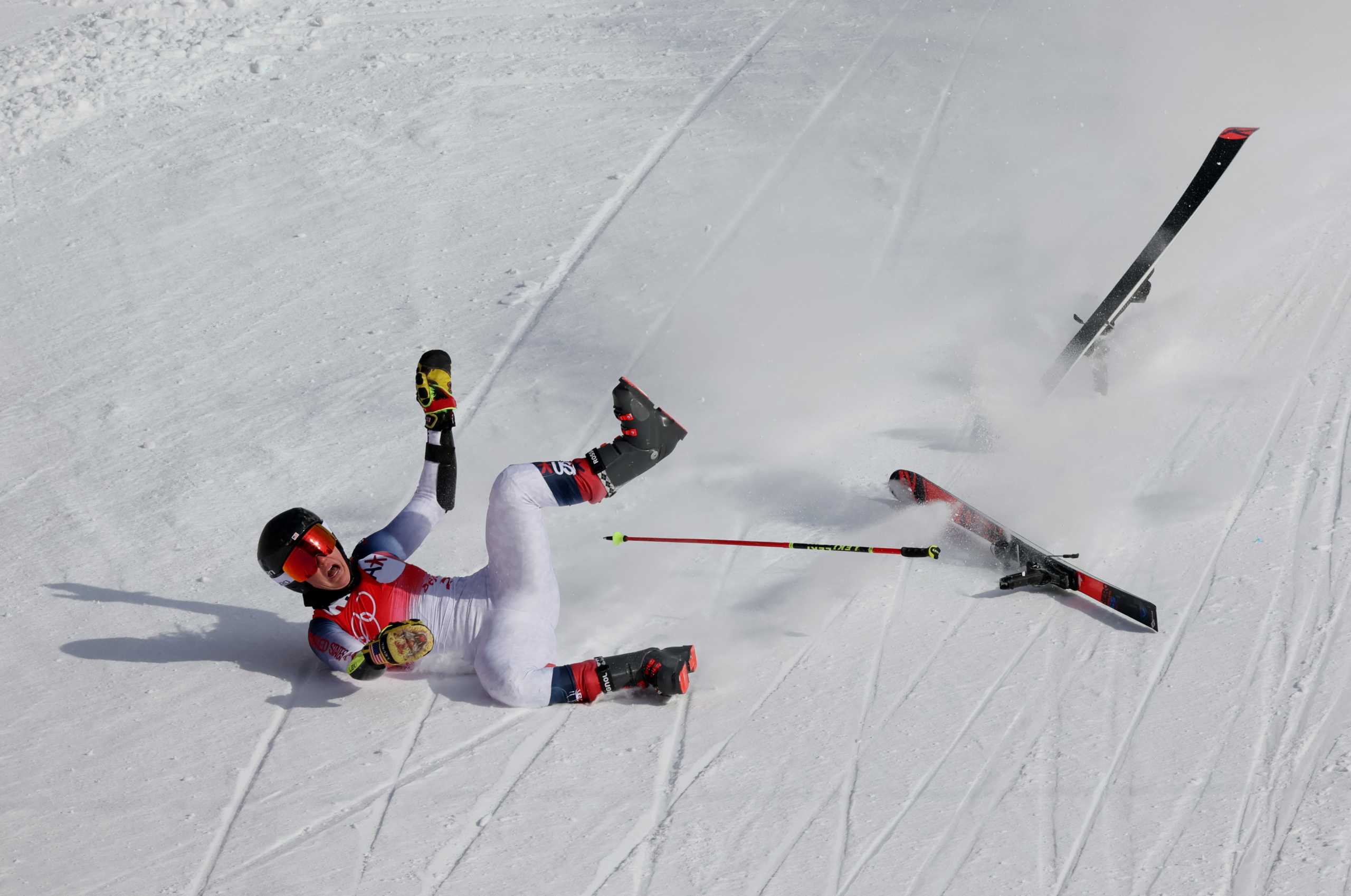 2022 Beijing Olympics - Alpine Skiing - Women's Giant Slalom Run 2 - National Alpine Skiing Centre, Yanqing district, Beijing, China - February 7, 2022. Nina O'Brien of the United States falls during her run. REUTERS