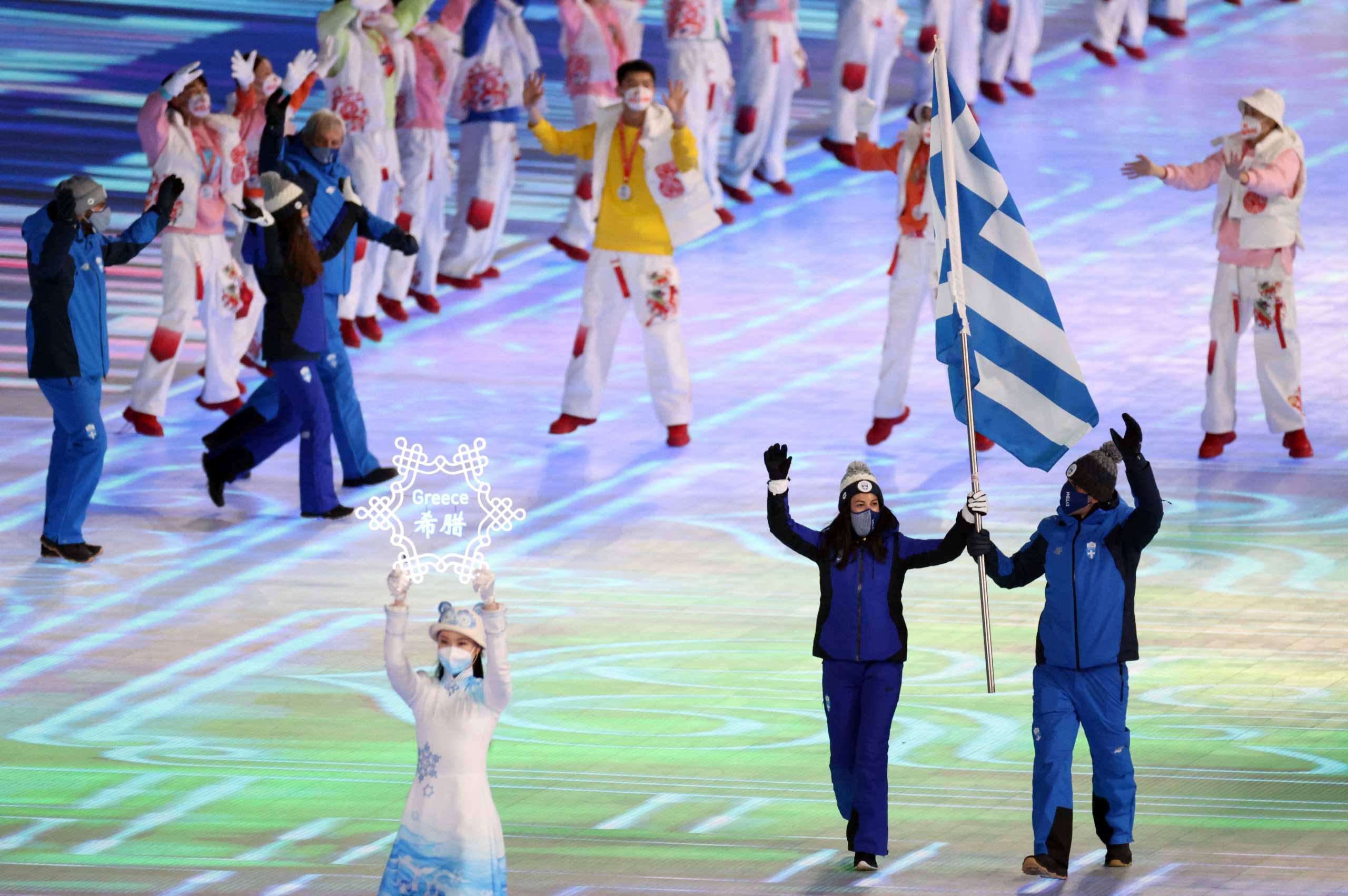 2022 Beijing Olympics - Opening Ceremony - National Stadium, Beijing, China - February 4, 2022. Flagbearers Maria Ntanou of Greece and Apostolos Angelis of Greece during the opening ceremony. REUTERS