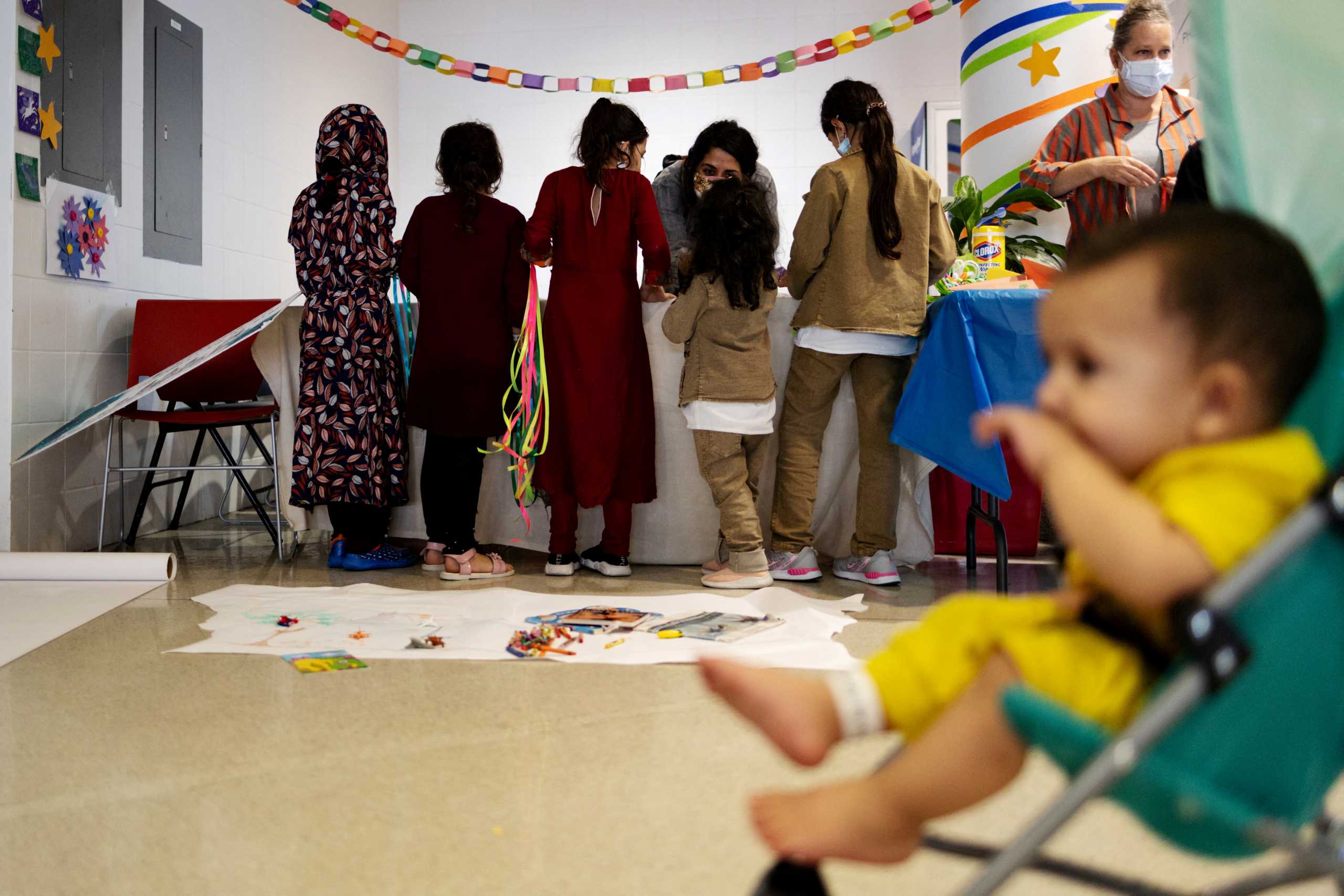 FILE PHOTO: Afghan evacuee children participate in social and emotional art initiatives run by Mural Arts after arriving at the Philadelphia International Airport in Philadelphia, Pennsylvania, U.S., October 25, 2021. REUTERS