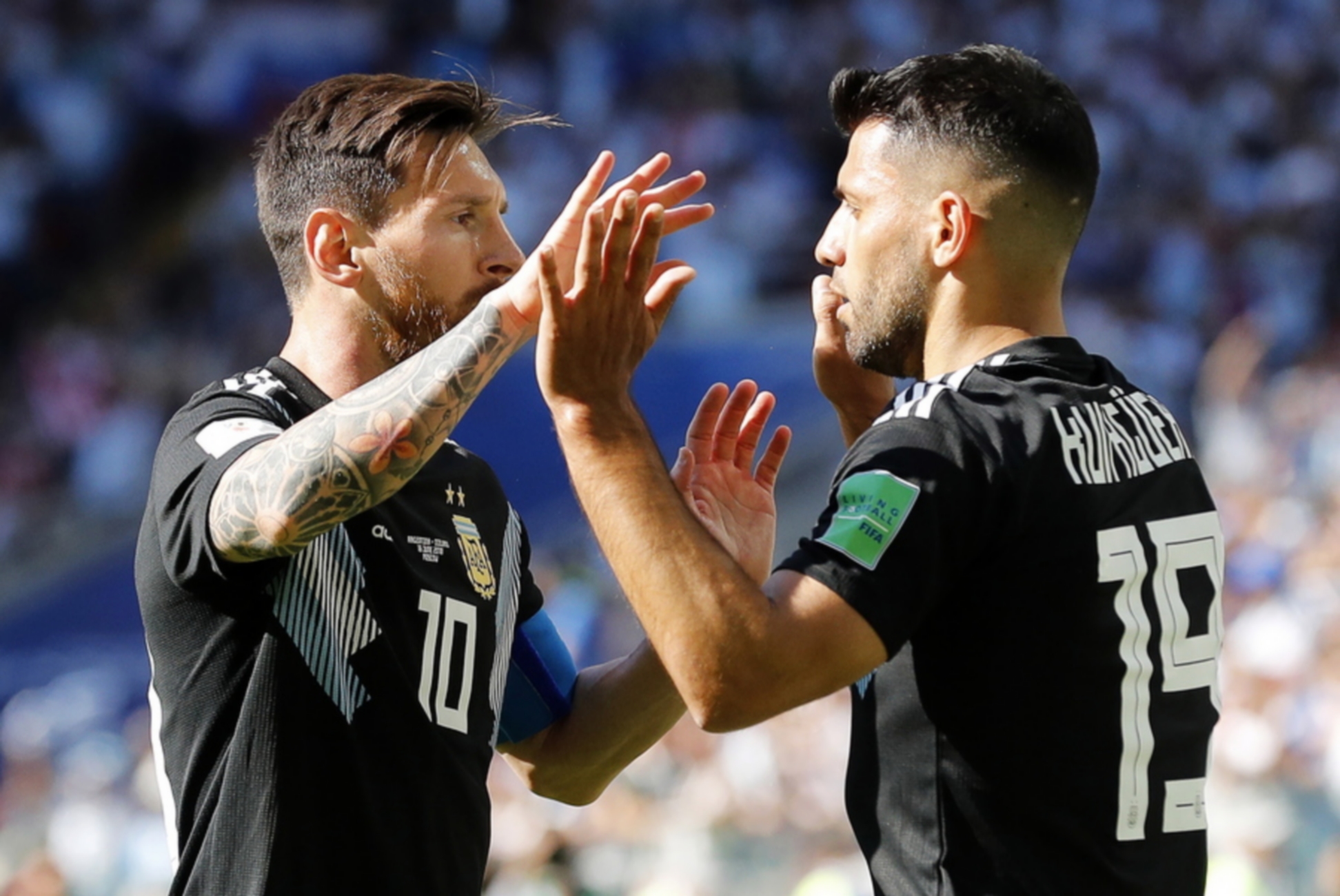 epa09642924 (FILE) - Sergio Aguero (R) of Argentina celebrates with teammate Lionel Messi after scoring the opening goal during the FIFA World Cup 2018 group D preliminary round soccer match between Argentina and Iceland in Moscow, Russia, 16 June 2018 (re-issued on 15 December 2021). Argentinian striker Sergio 'Kun' Aguero announced his retirement during a press conference in Barcelona, Spain, on 15 December 2021.  EPA