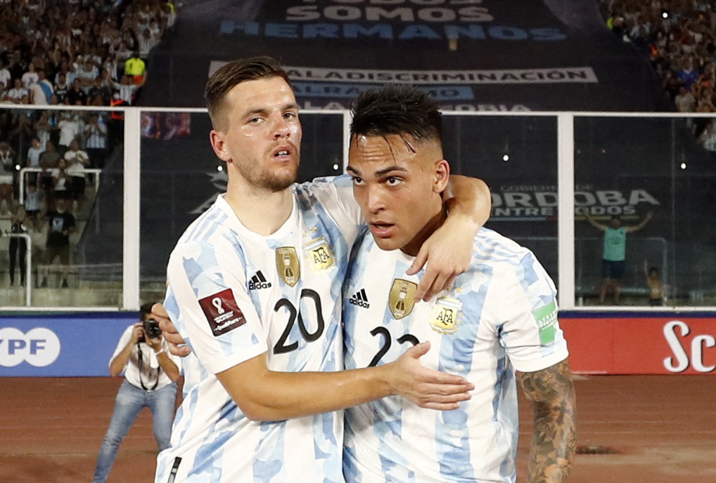 Soccer Football - World Cup - South American Qualifiers - Argentina v Colombia - Estadio Mario Alberto Kempes, Cordoba, Argentina - February 1, 2022 Argentina's Lautaro Martinez celebrates scoring their first goal with Giovani Lo Celso REUTERS