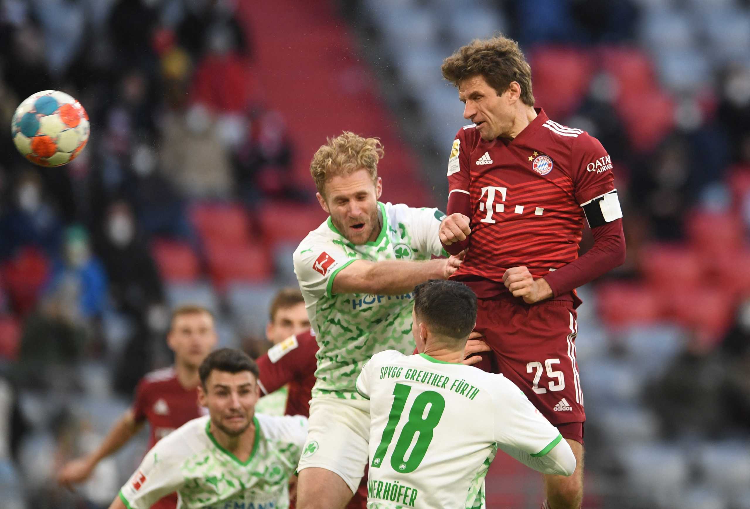 Soccer Football - Bundesliga - Bayern Munich v Greuther Fuerth - Allianz Arena, Munich, Germany - February 20, 2022  Bayern Munich's Thomas Muller heads at goal REUTERS