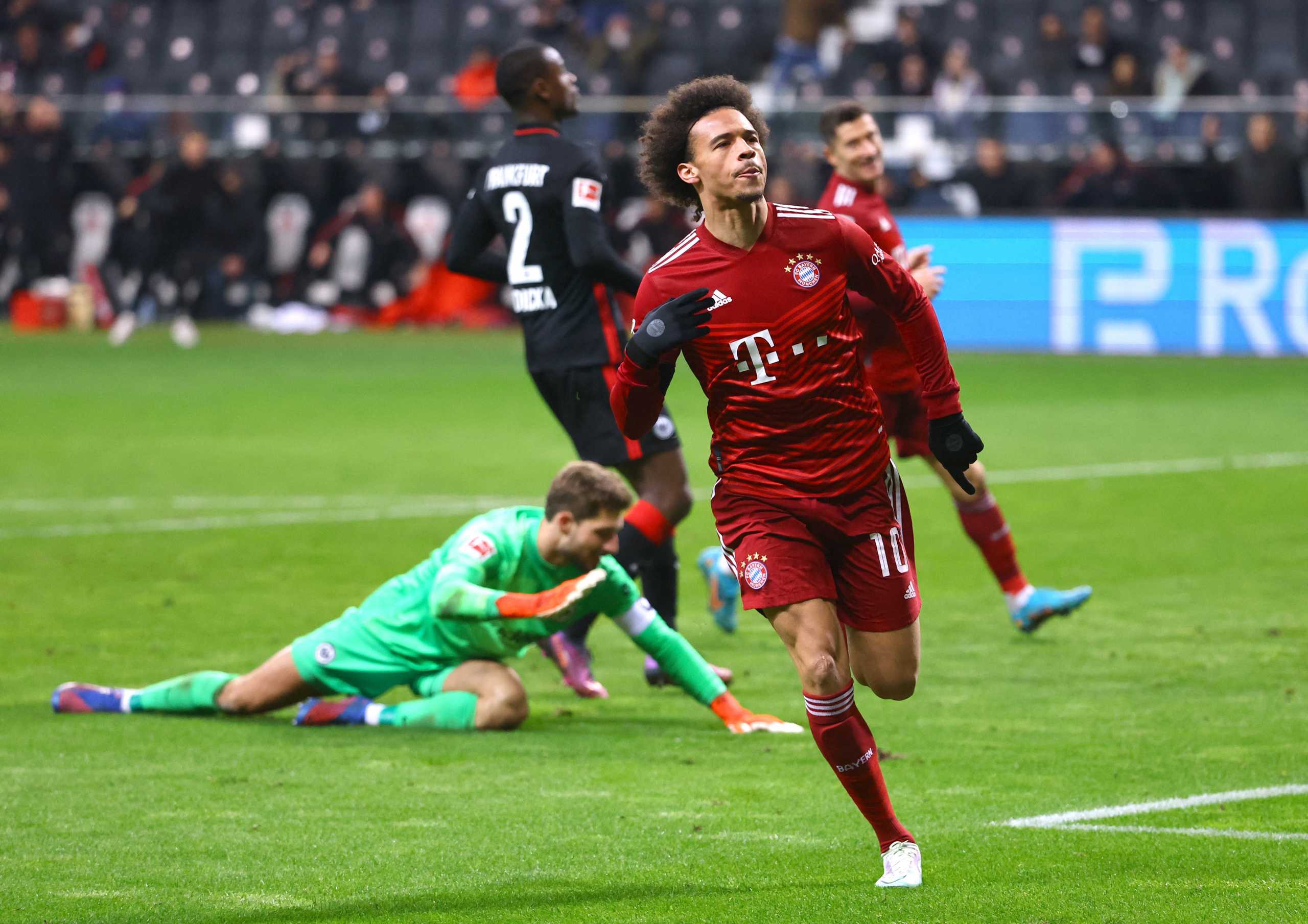 Soccer Football - Bundesliga - Eintracht Frankfurt v Bayern Munich - Deutsche Bank Park, Frankfurt, Germany - February 26, 2022 Bayern Munich's Leroy Sane celebrates scoring their first goal REUTERS