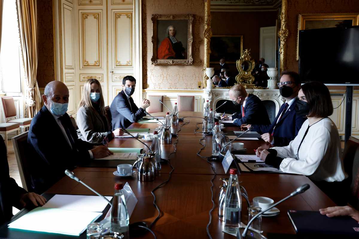 French Foreign Affairs Minister Jean-Yves Le Drian meets Belarus opposition leader Sviatlana Tsikhanouskaya in Paris, amid Russia's invasion of Ukraine in Paris, France, February 25, 2022. REUTERS