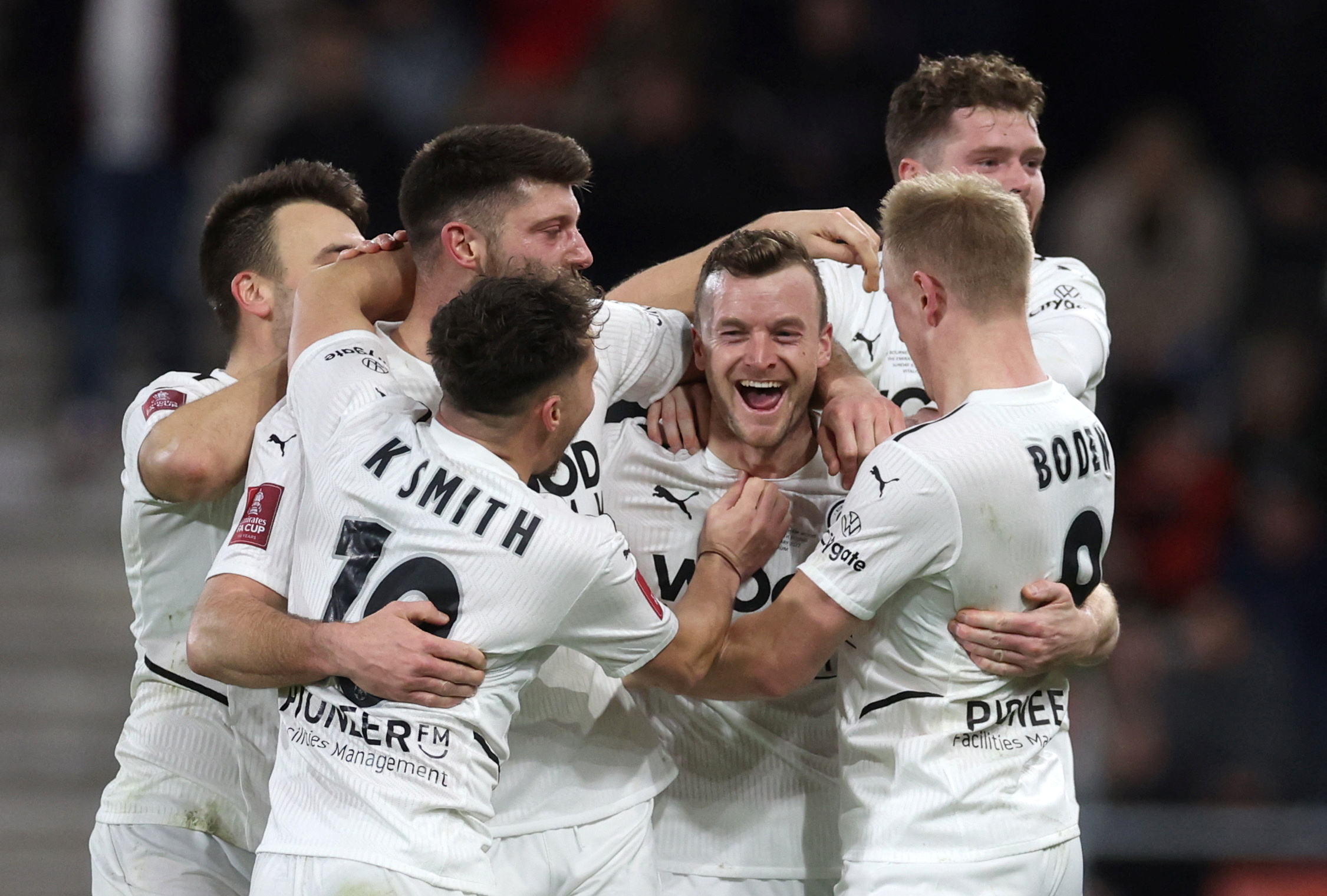 Soccer Football - FA Cup - Fourth Round - AFC Bournemouth v Boreham Wood - Vitality Stadium, Bournemouth, Britain - February 6, 2022 Boreham Wood's Mark Ricketts celebrates scoring their first goal with teammates  Action Images via Reuters