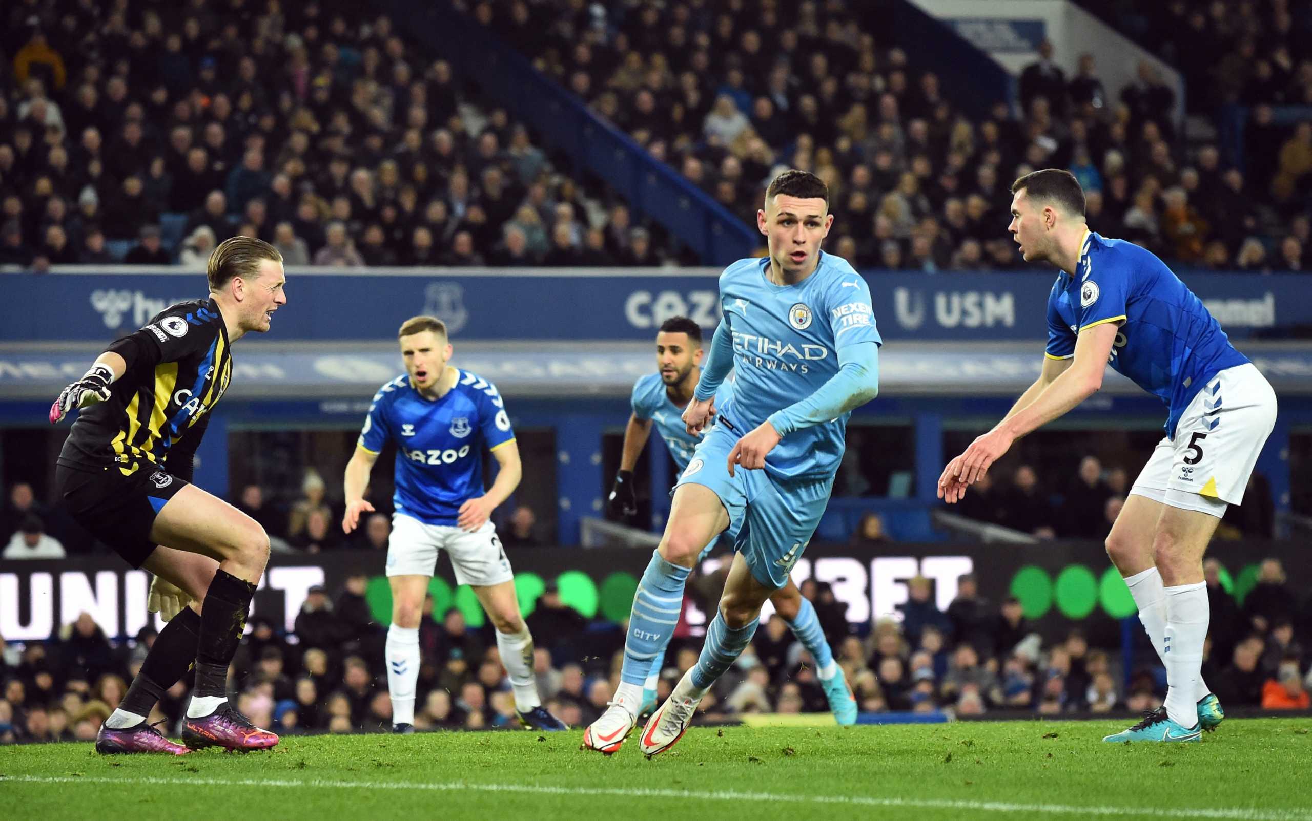 Soccer Football - Premier League - Everton v Manchester City - Goodison Park, Liverpool, Britain - February 26, 2022 Manchester City's Phil Foden celebrates scoring their first goal REUTERS