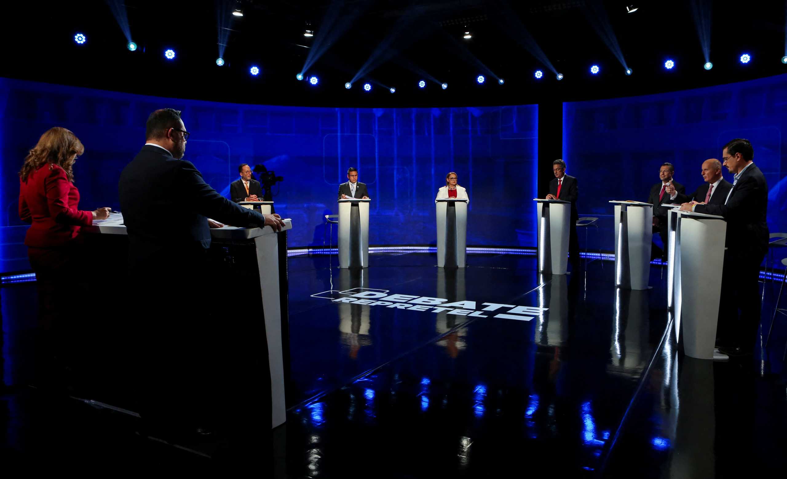 Costa Rica Presidential candidates Eliecer Feinzaig of Progressive Liberal Party (PLP), Fabricio Alvarado of the New Republic Party (PNR), Lineth Saborio of Social Christian Unity Party (PUSC), Welmer Ramos of Citizen Action Party (PAC), Rodrigo Chaves of the Social Democratic Progress Party (PPSD), Jose Maria Figueres of the National Liberation Party (PLN), and Jose Maria Villalta of the Broad Front (FA) take part in the television debate, ahead of the general election, in Heredia, Costa Rica, February 3, 2022.  Picture taken February 3, 2022. REUTERS