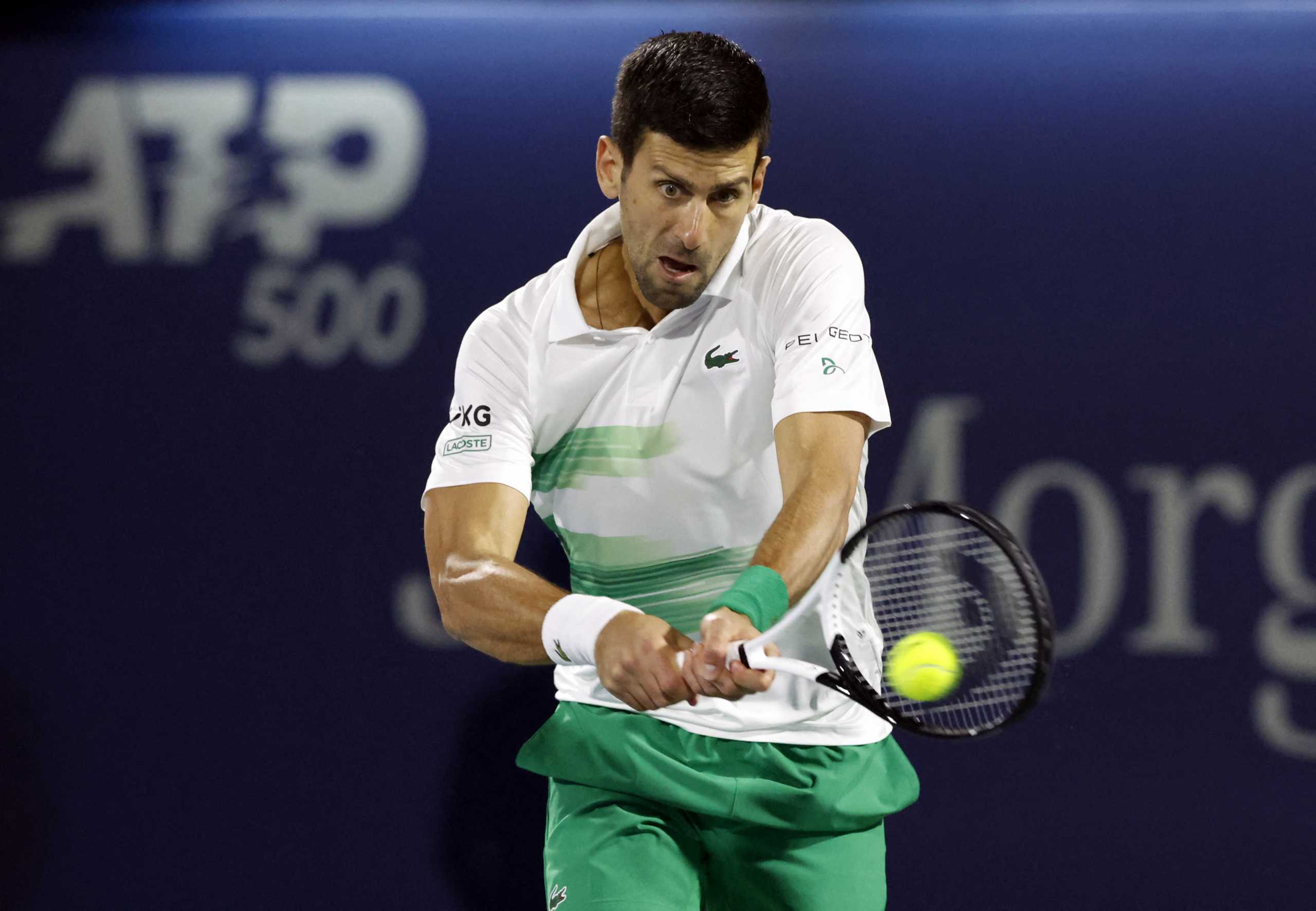 Tennis - ATP 500 - Dubai Tennis Championships - Aviation Club Tennis Centre, Dubai, United Arab Emirates - February 21, 2022 Serbia's Novak Djokovic in action during his first round match against Italy's Lorenzo Musetti REUTERS