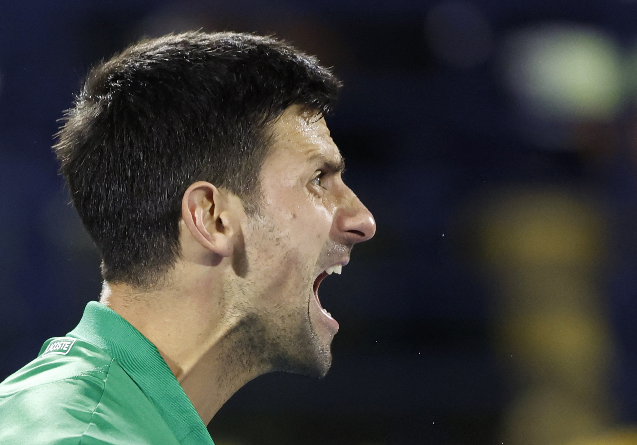 Tennis - ATP 500 - Dubai Tennis Championships - Aviation Club Tennis Centre, Dubai, United Arab Emirates - February 21, 2022 Serbia's Novak Djokovic reacts during his first round match against Italy's Lorenzo Musetti REUTERS