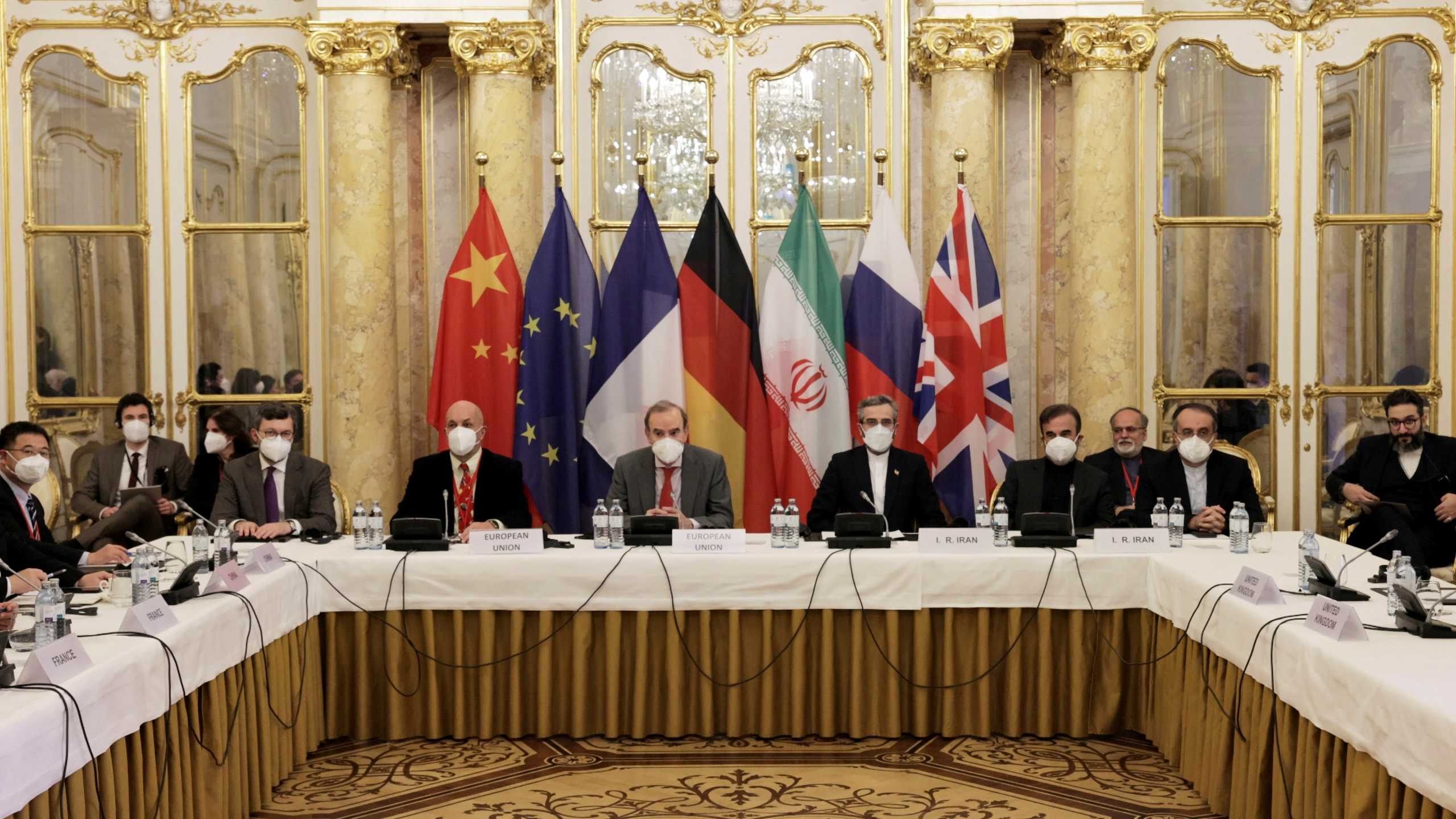 FILE PHOTO: Deputy Secretary General of the European External Action Service (EEAS) Enrique Mora and Iran's chief nuclear negotiator Ali Bagheri Kani and delegations wait for the start of a meeting of the JCPOA Joint Commission in Vienna, Austria December 17, 2021. EU Delegation in Vienna