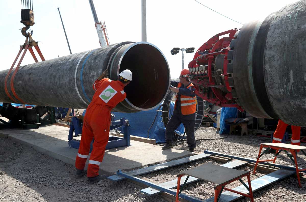 FILE PHOTO: Workers are seen at the construction site of the Nord Stream 2 gas pipeline, near the town of Kingisepp, Leningrad region, Russia, June 5, 2019. REUTERS