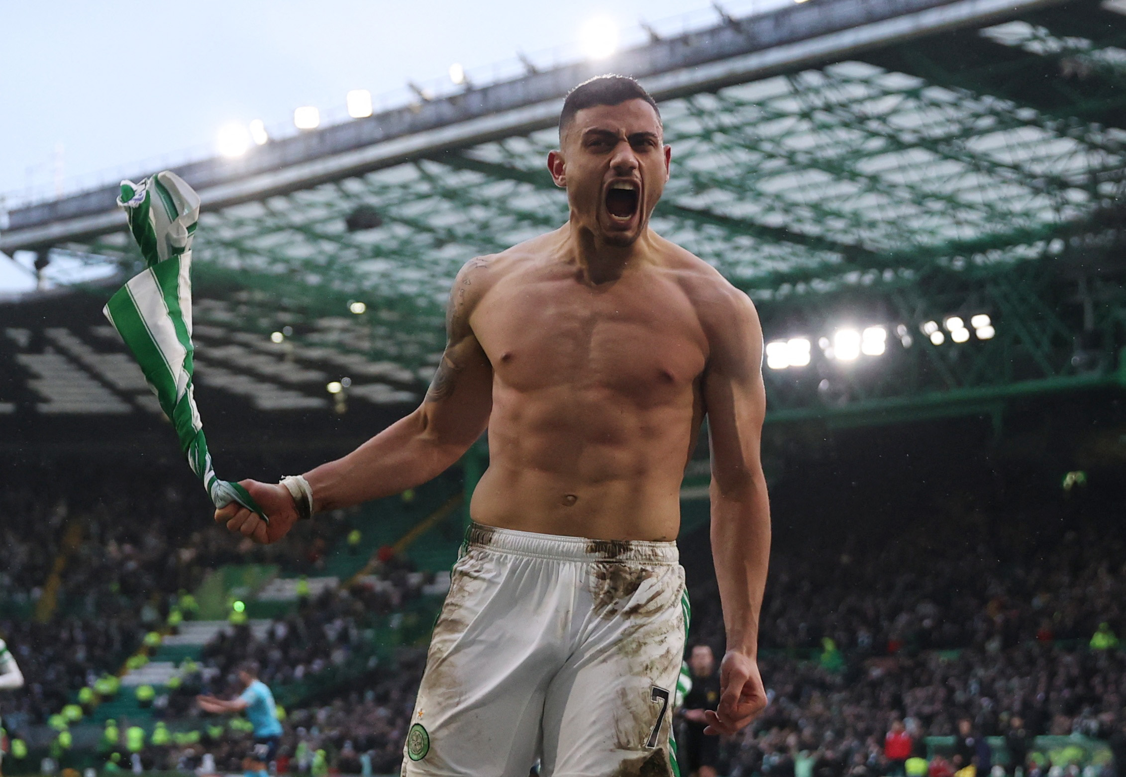 Soccer Football - Scottish Premiership - Celtic v Dundee - Celtic Park, Glasgow, Scotland, Britain - February 20, 2022 Celtic's Georgios Giakoumakis celebrates scoring their third goal and completing his hat-trick Action Images via Reuters