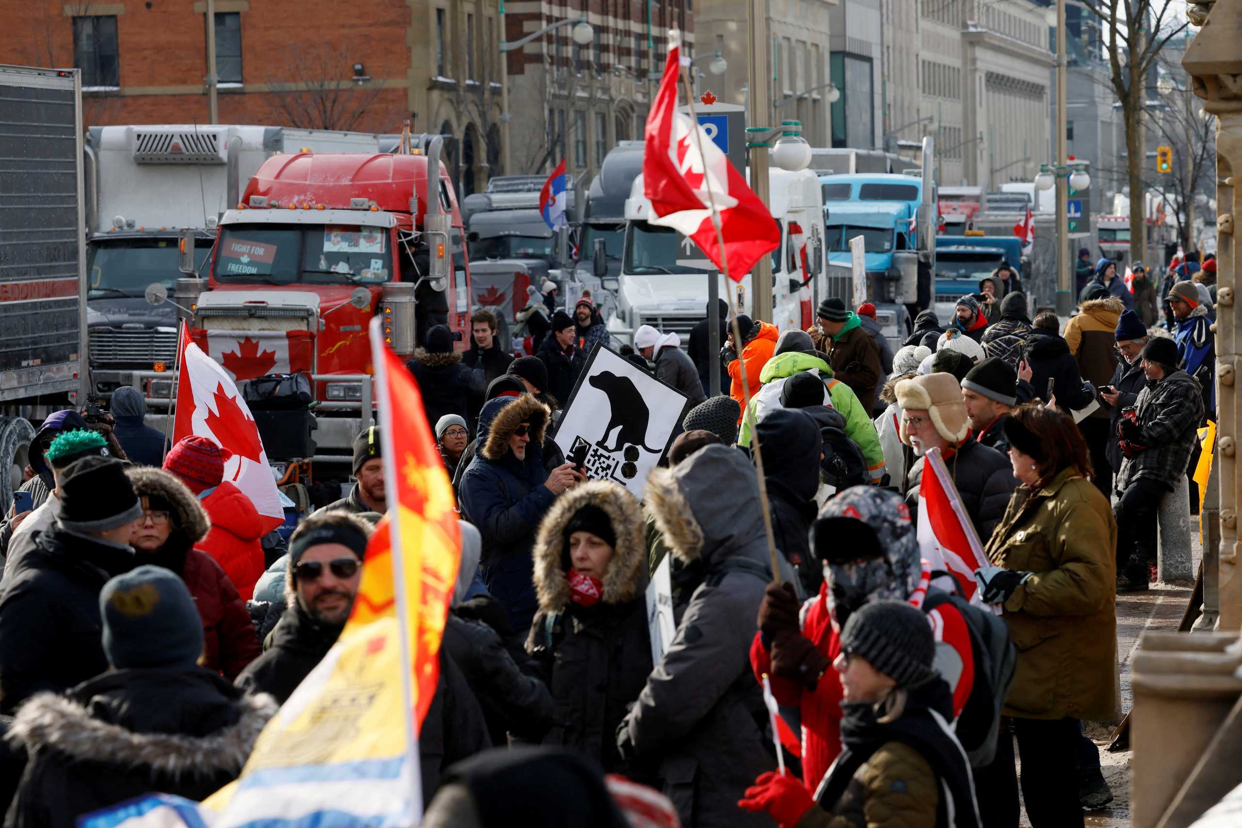 FILE PHOTO: Truckers and supporters continue to protest coronavirus disease (COVID-19) vaccine mandates in front of Parliament Hill in Ottawa, Ontario, Canada, February 1, 2022. REUTERS