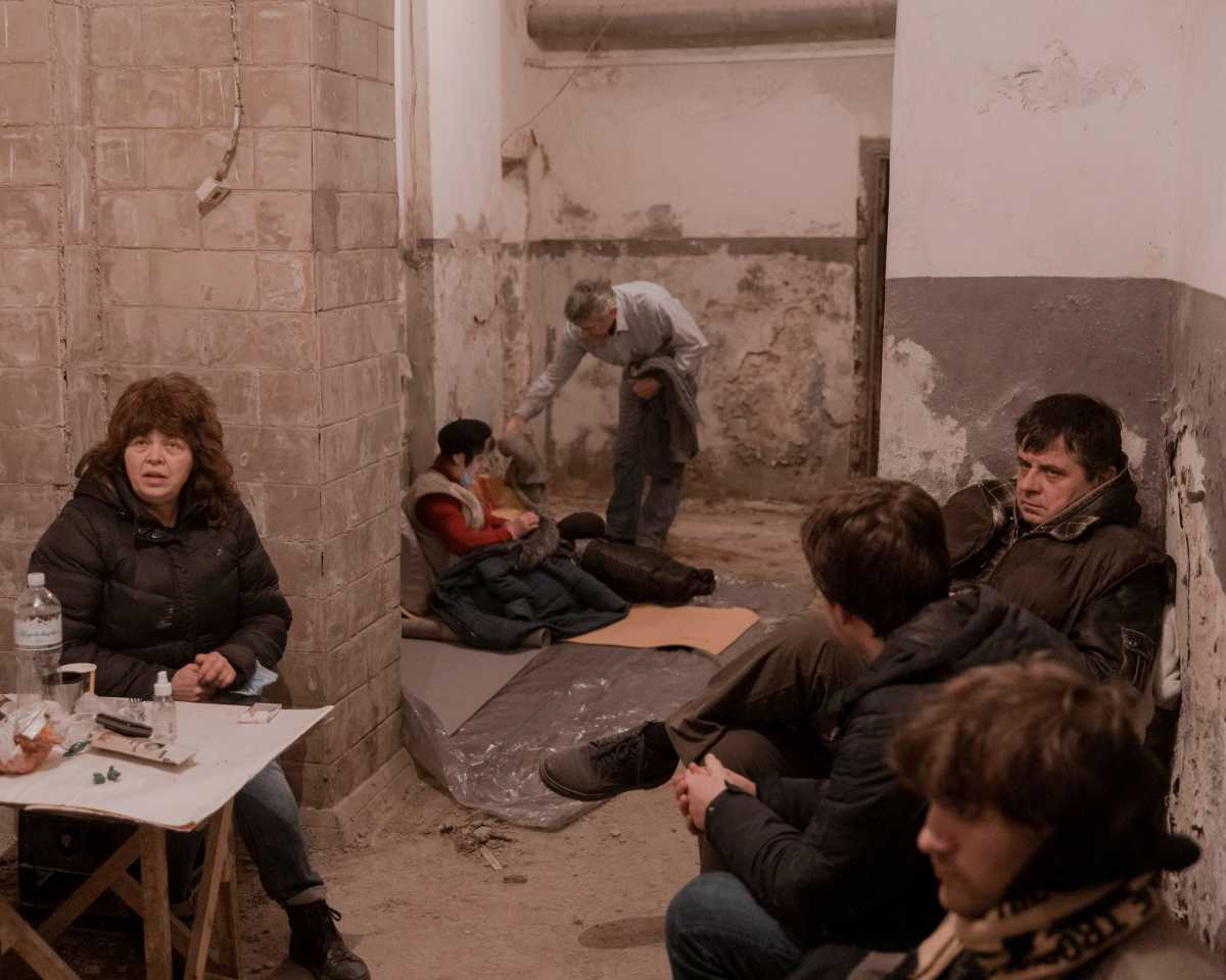 Residents take shelter in the basement of an apartment building, after Russia launched a massive military operation against Ukraine, in Kyiv, Ukraine late February 26, 2022. Picture taken February 26, 2022. Jedrzej Nowicki