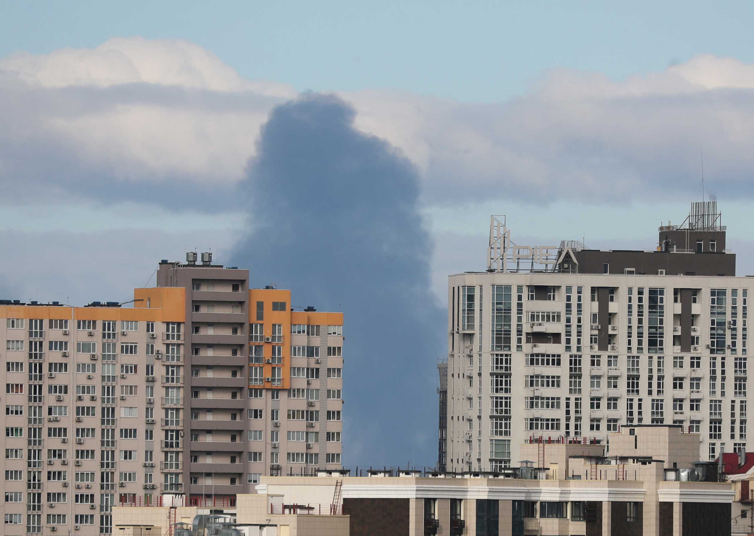 Smoke rising after shelling on the outskirts of the city is pictured from central Kyiv, Ukraine February 27, 2022. REUTERS