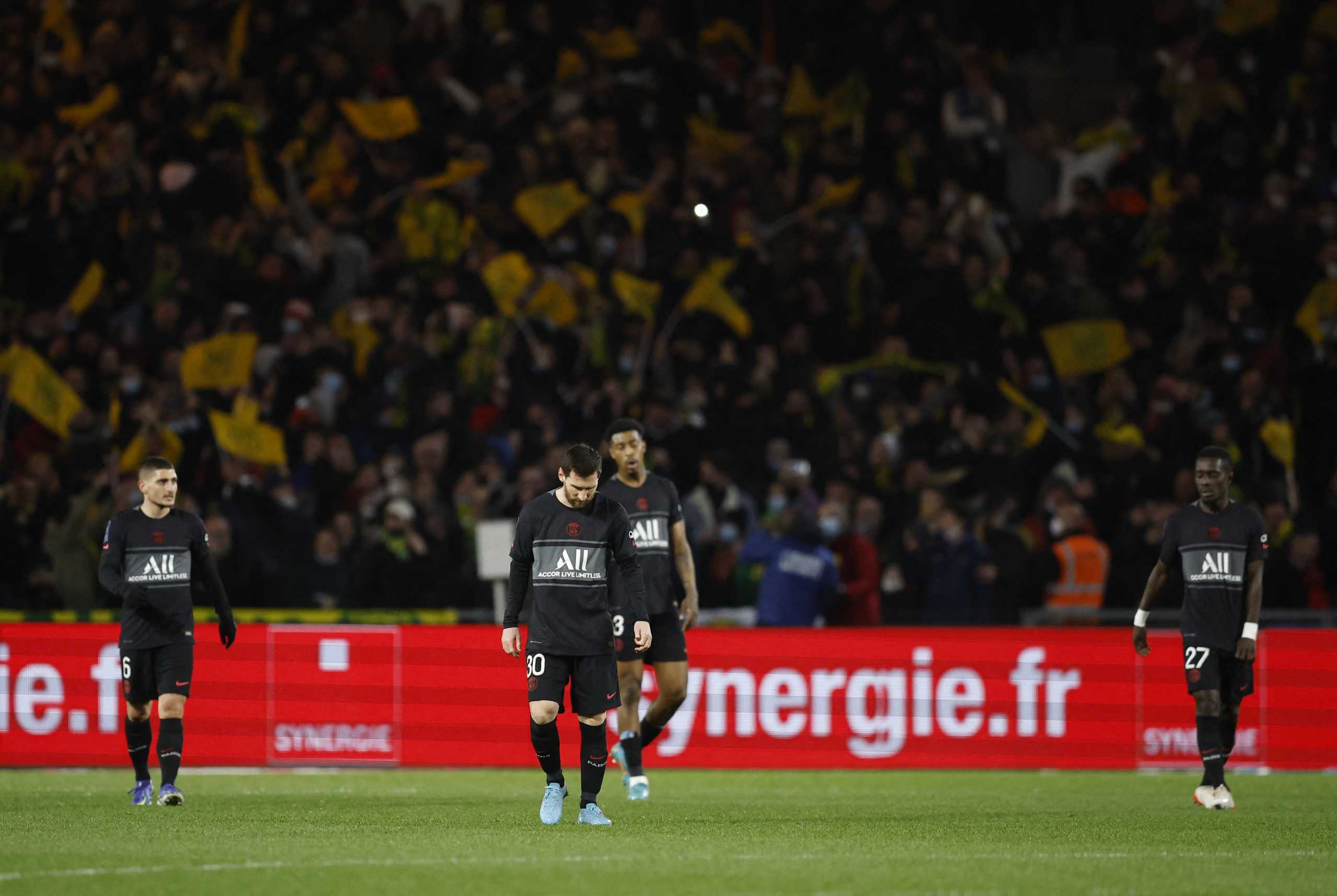 Soccer Football - Ligue 1 - Nantes v Paris St Germain - The Stade de la Beaujoire - Louis Fonteneau, Nantes, France - February 19, 2022  Paris St Germain's Lionel Messi looks dejected after Nantes' Quentin Merlin scored their second goal REUTERS