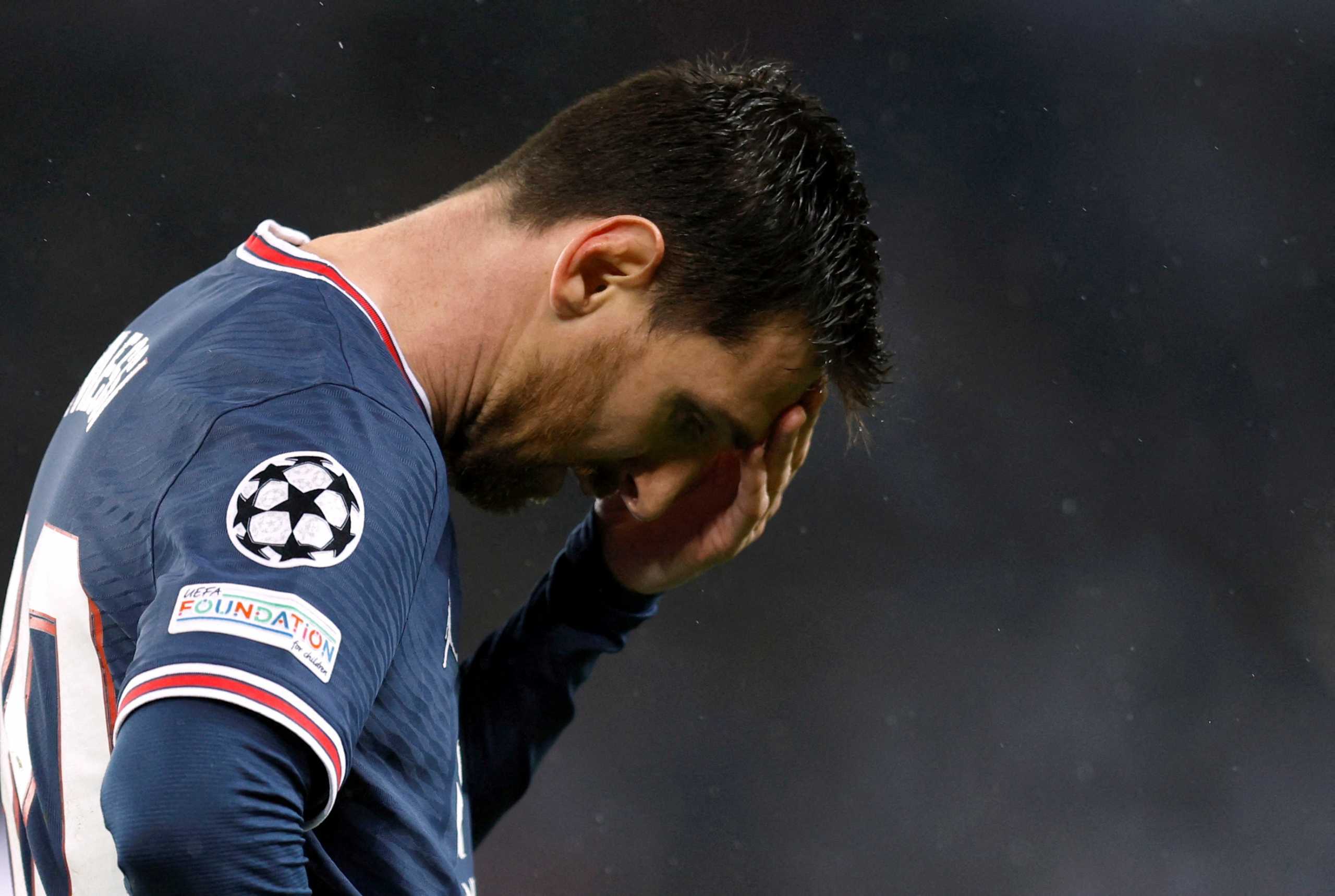 Soccer Football - Champions League - Round of 16 First Leg - Paris St Germain v Real Madrid - Parc des Princes, Paris, France - February 15, 2022 Paris St Germain's Lionel Messi reacts REUTERS