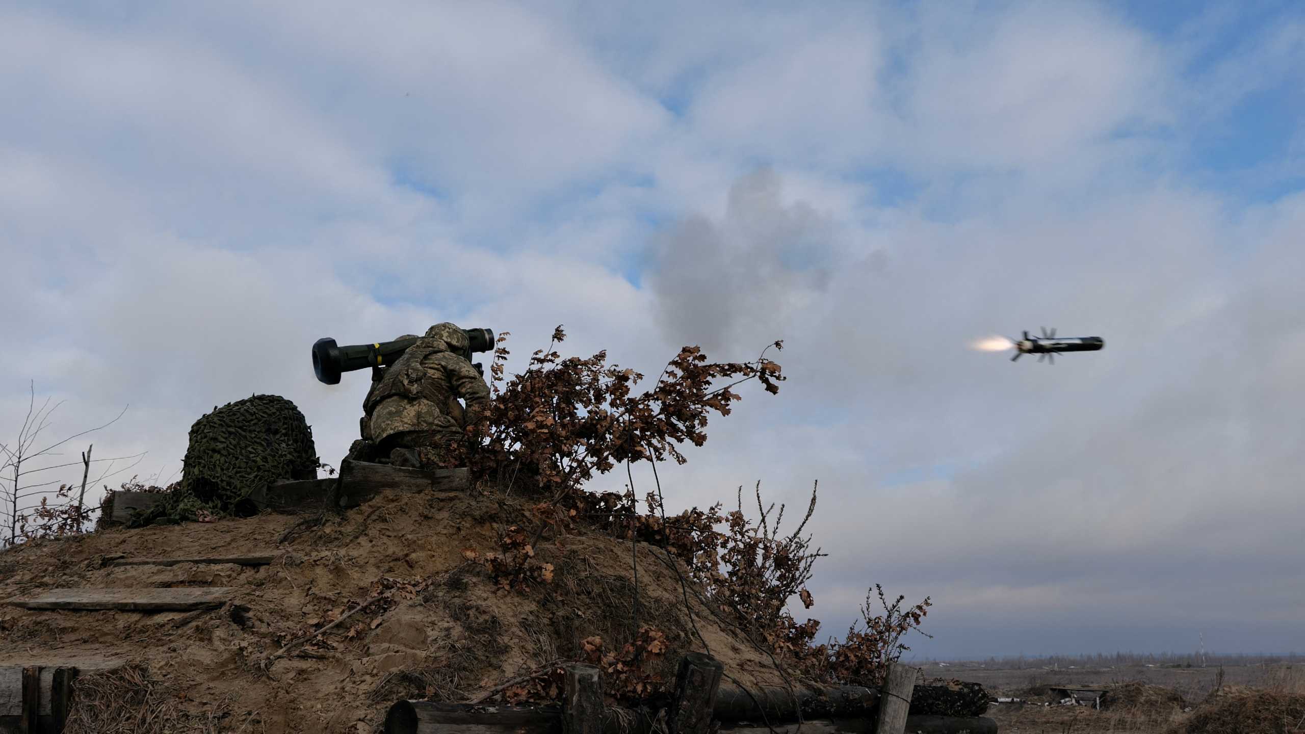Service members of the Ukrainian Armed Forces fire a Javelin anti-tank missile during drills at a training ground in an unknown location in Ukraine, in this handout picture released February 18, 2022. Ukrainian Joint Forces Operation Press Service