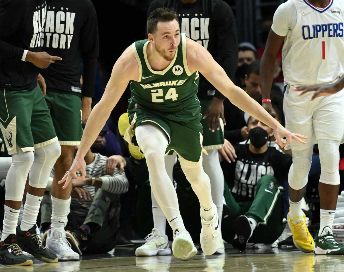 Feb 6, 2022; Los Angeles, California, USA;    Milwaukee Bucks guard Pat Connaughton (24) celebrates after a 3-point basket in the second half against the Los Angeles Clippers at Crypto.com Arena. Mandatory Credit: Jayne Kamin-Oncea-USA TODAY Sports