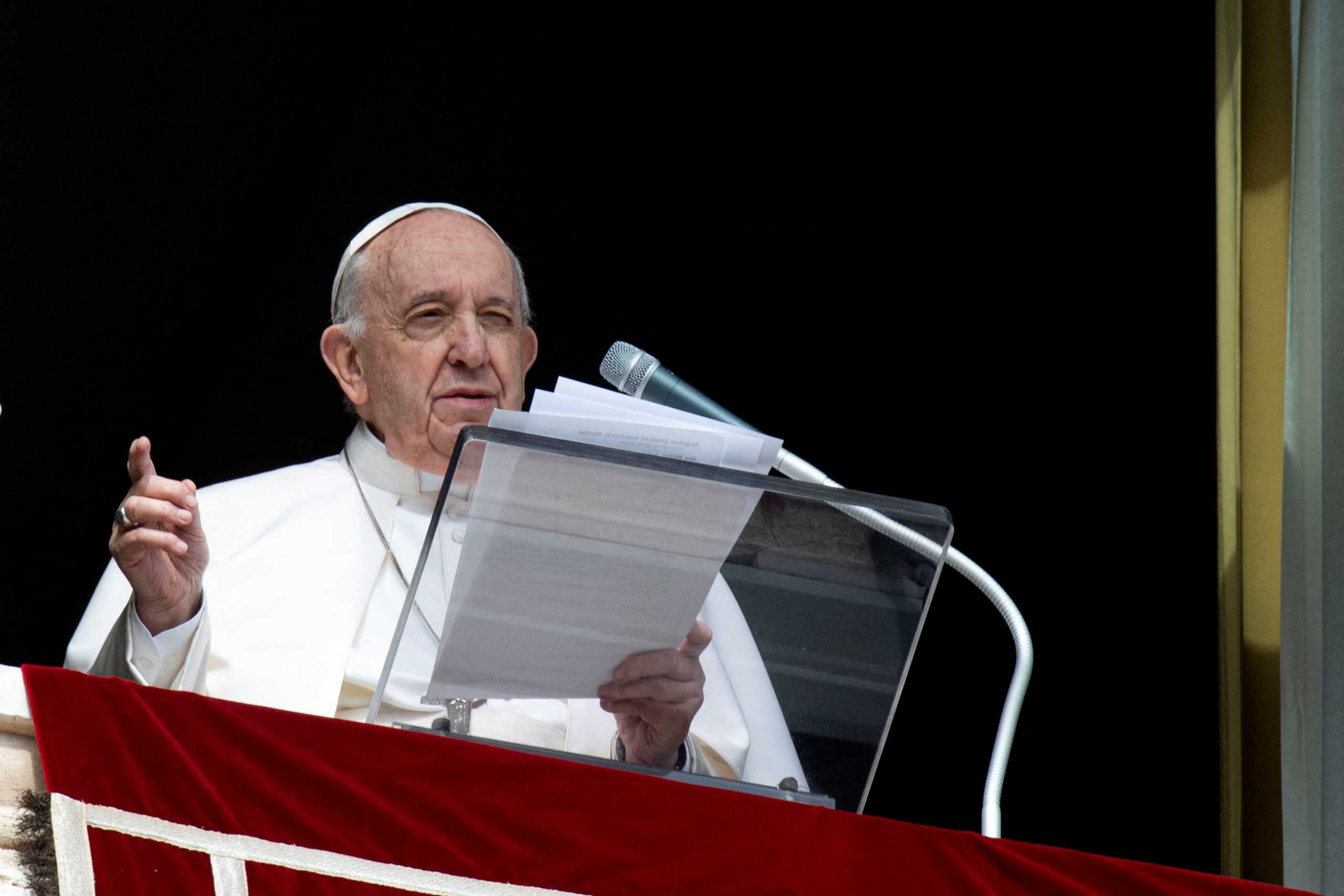 Pope Francis leads the Angelus prayer from a window of the Apostolic Palace at the Vatican February 13, 2022.   Vatican Media