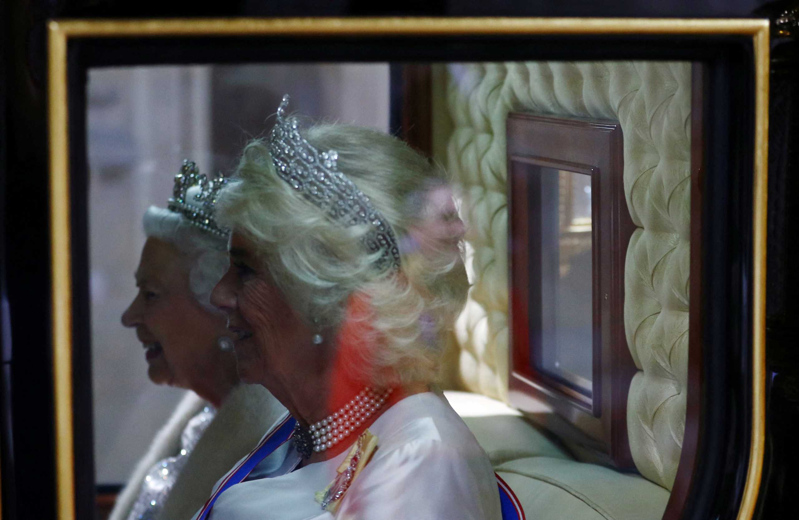 FILE PHOTO: Britain's Queen Elizabeth's arrives with Camilla, the Duchess of Cornwall at the State Opening of Parliament in London, Britain October 14, 2019. REUTERS