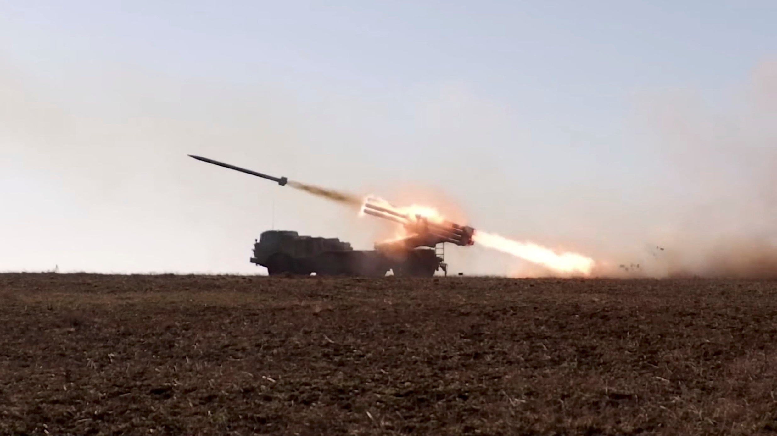 A Russian "Uragan" self-propelled multiple rocket launcher system launches a rocket during military exercises at the Opuk training area in Crimea, in this still image taken from a handout video released February 15, 2022. Russian Defence Ministry