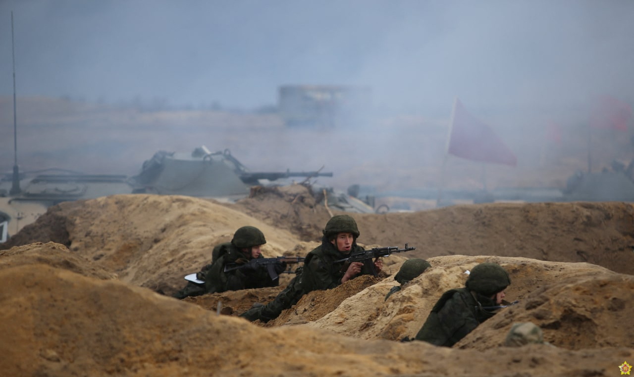 Service members take part in military exercises held by the armed forces of Russia and Belarus at the Brestsky training ground in the Brest region, Belarus, in this handout photo released February 12, 2022. Belarusian Defence Ministry