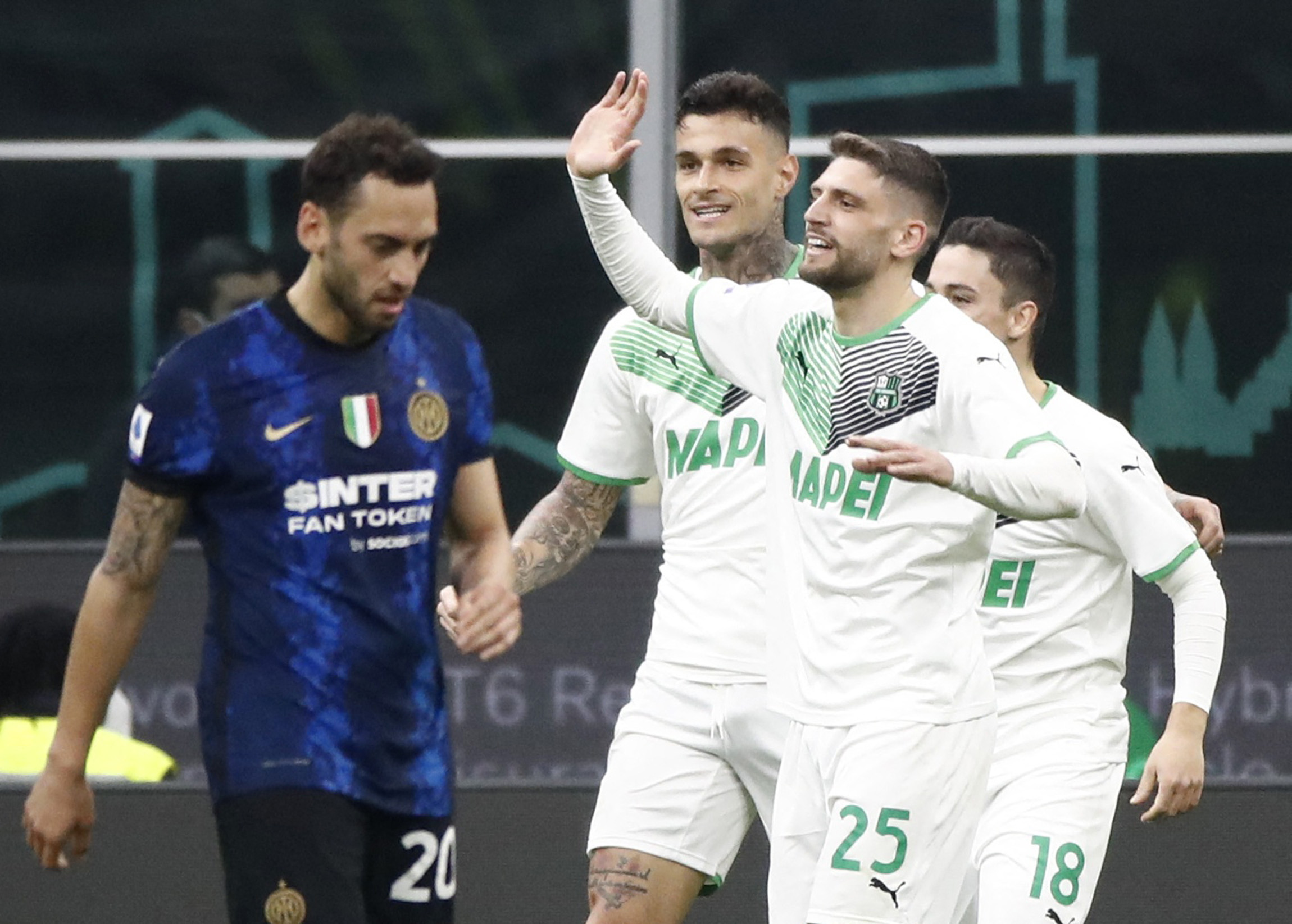 Soccer Football - Serie A - Inter Milan v Sassuolo - San Siro, Milan, Italy - February 20, 2022  Sassuolo's Gianluca Scamacca celebrates scoring their second goal with Giacomo Raspadori and Domenico Berardi REUTERS