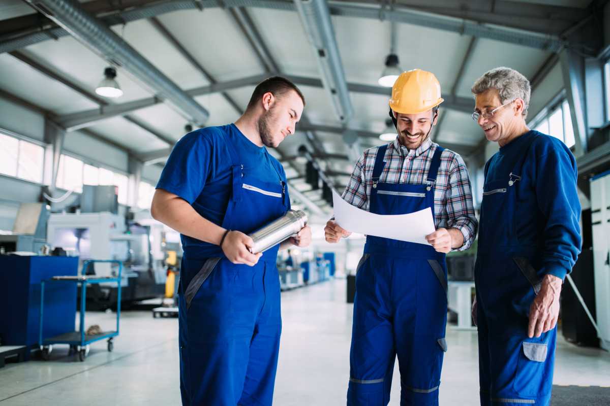Portrait of an handsome engineer in a factory