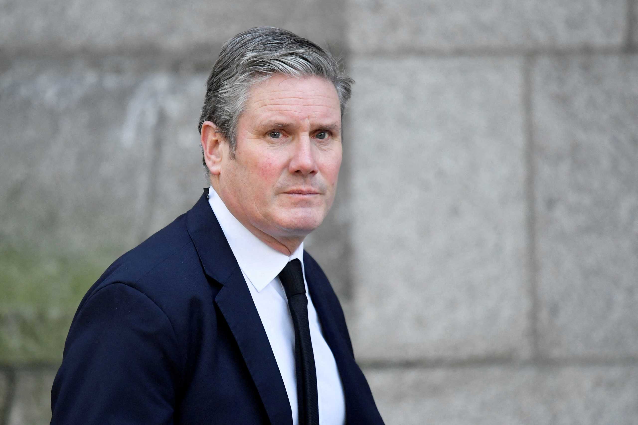 FILE PHOTO: Britain's Labour Party leader Keir Starmer arrives for the remembrance mass of MP David Amess, who was stabbed to death during a meeting with constituents, at Westminster Cathedral in London, Britain, November 23, 2021. REUTERS