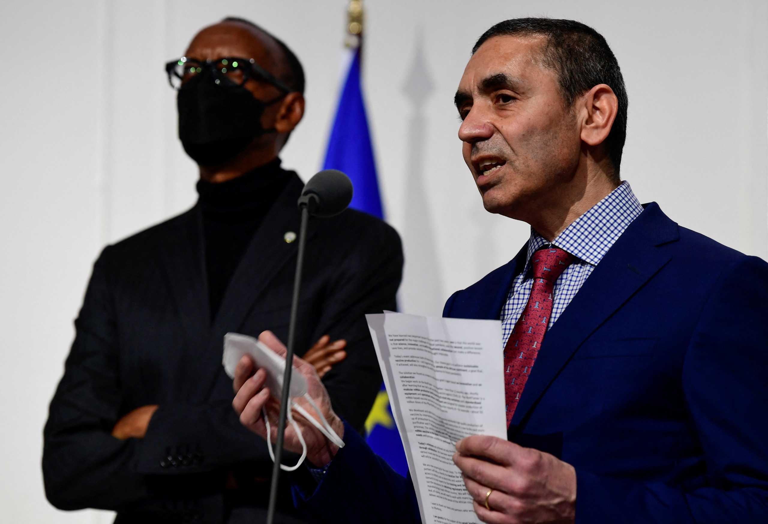 CEO of BioNTech Ugur Sahin speaks to the media as he stands in front of so-called "BioNTainer", a system to produce vaccines in Africa, during a presentation in Marburg, Germany, February 16, 2022. REUTERS