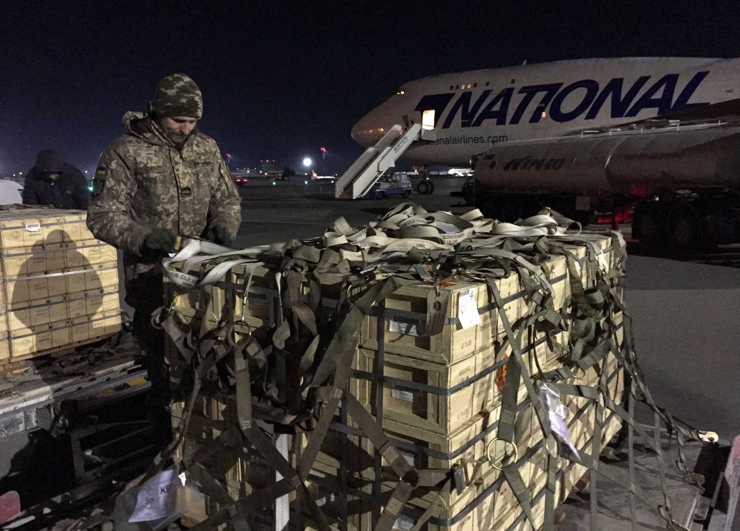 Military aid, delivered as part of the United States' security assistance to Ukraine, is unloaded from a plane at the Boryspil International Airport outside Kyiv, Ukraine February 13, 2022. REUTERS