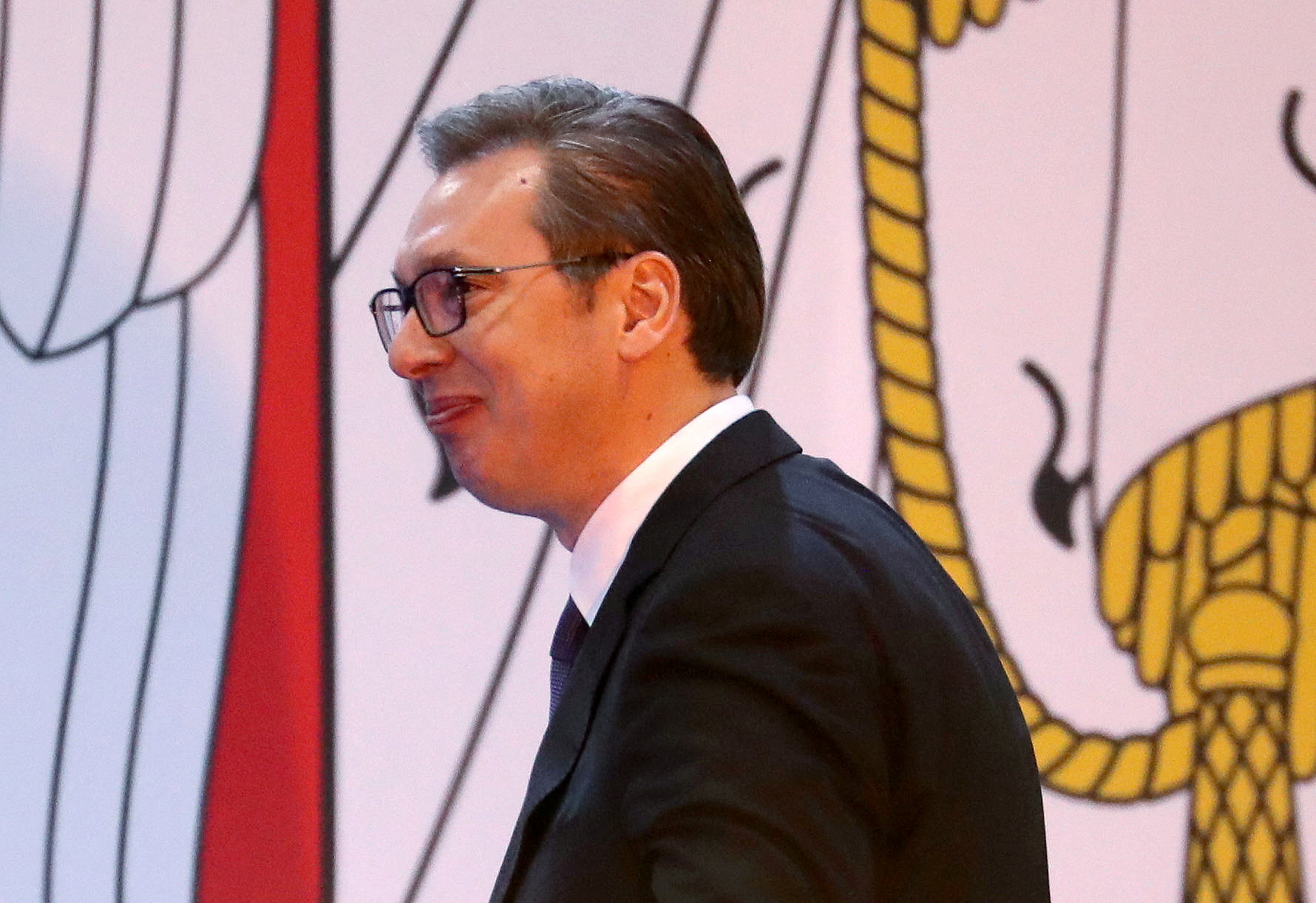 FILE PHOTO: Serbian President Aleksandar Vucic arrives to address supporters in front of parliament in Belgrade, Serbia, April 19, 2019. REUTERS