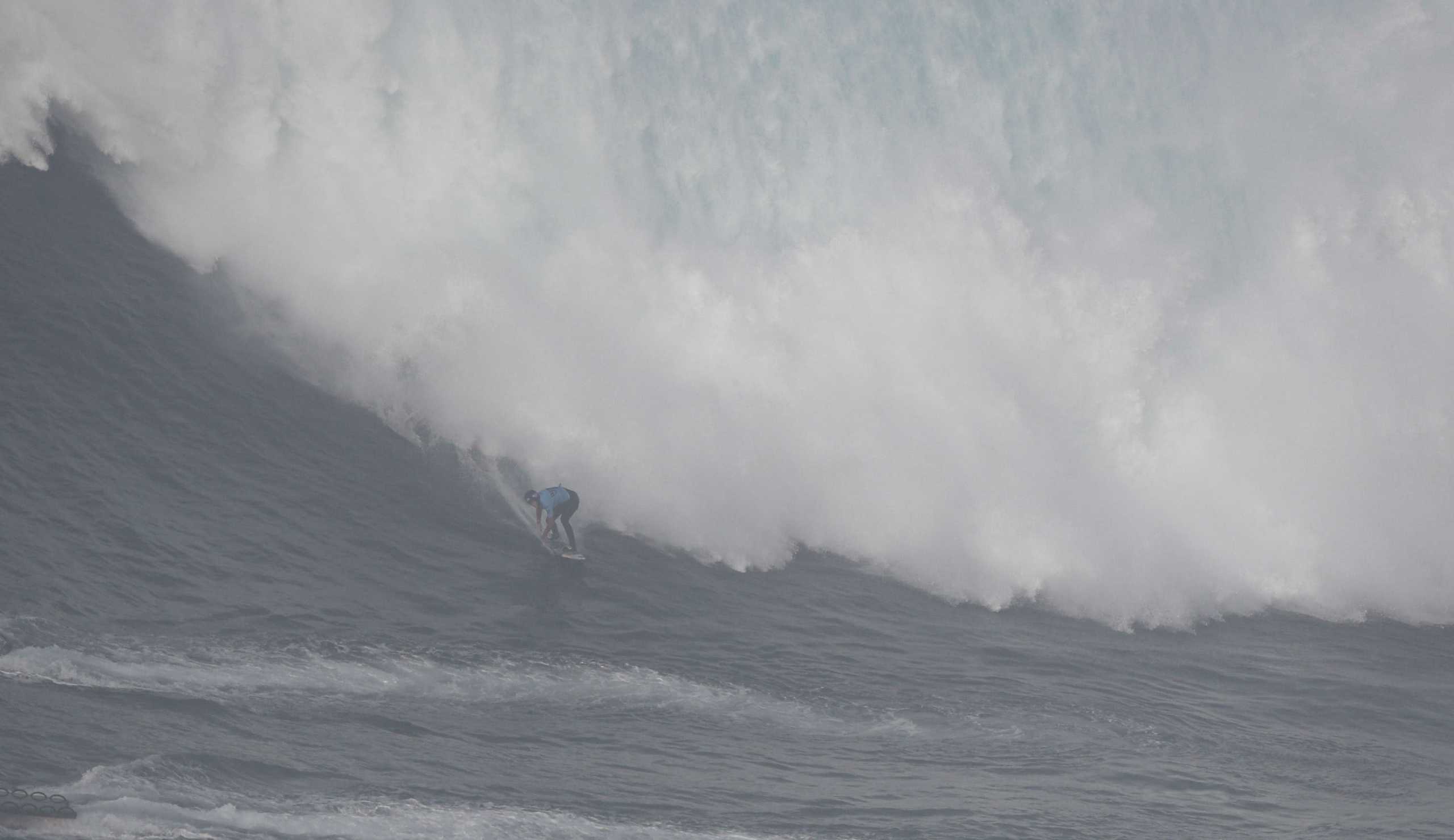 Justine Dupont rides a wave in Praia do Norte, Nazare, Portugal, February 10, 2022. REUTERS
