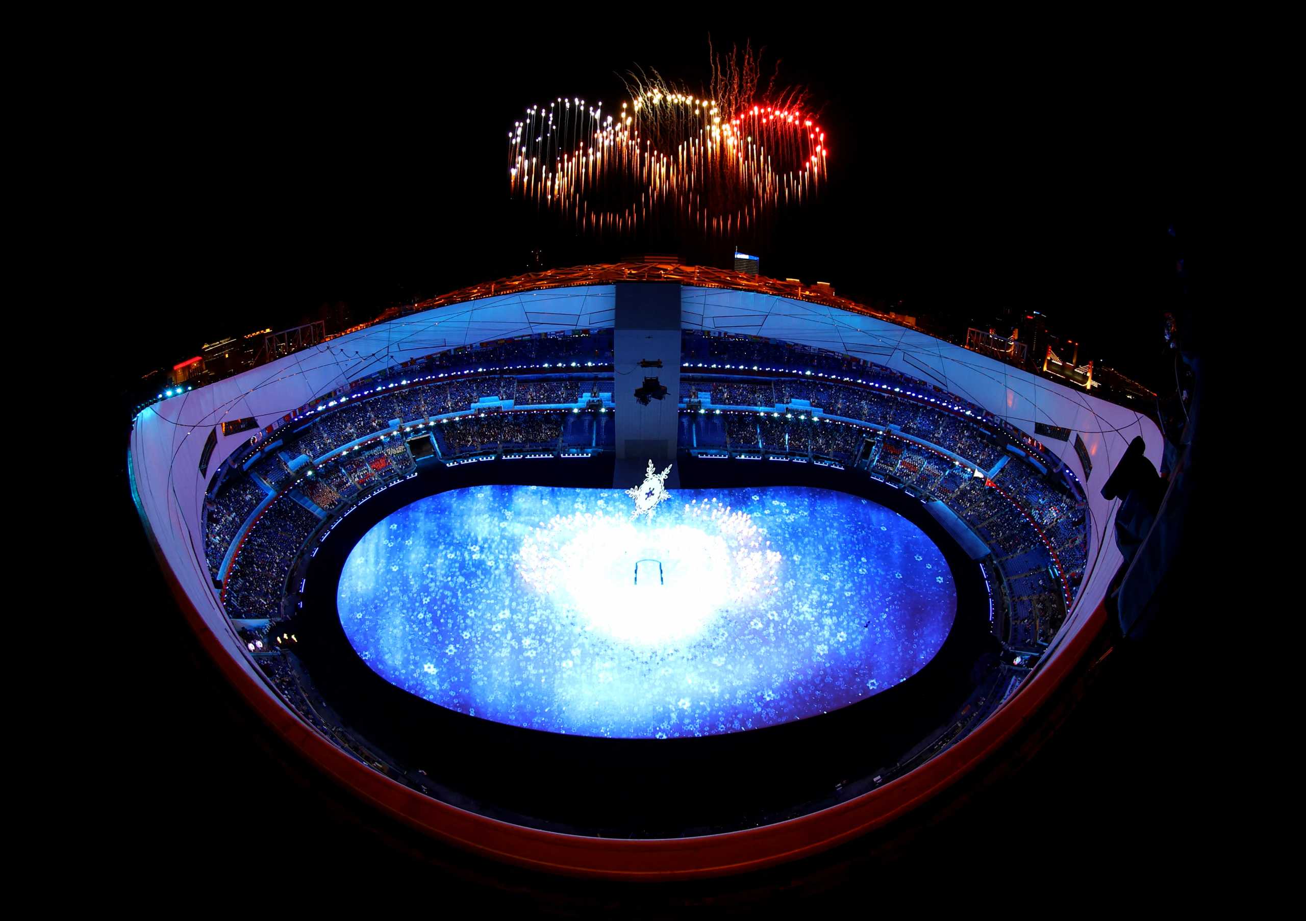 2022 Beijing Olympics - Opening Ceremony - National Stadium, Beijing, China - February 4, 2022. General view of the Olympic cauldron and fireworks during the opening ceremony. REUTERS
