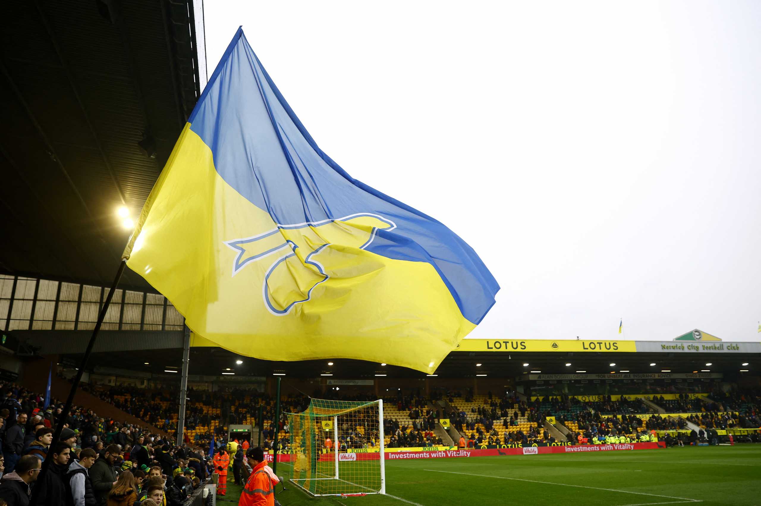 Soccer Football - Premier League - Norwich City v Brentford - Carrow Road, Norwich, Britain - March 5, 2022  Fans display a flag in support of Ukraine inside the stadium before the match Action Images via Reuters